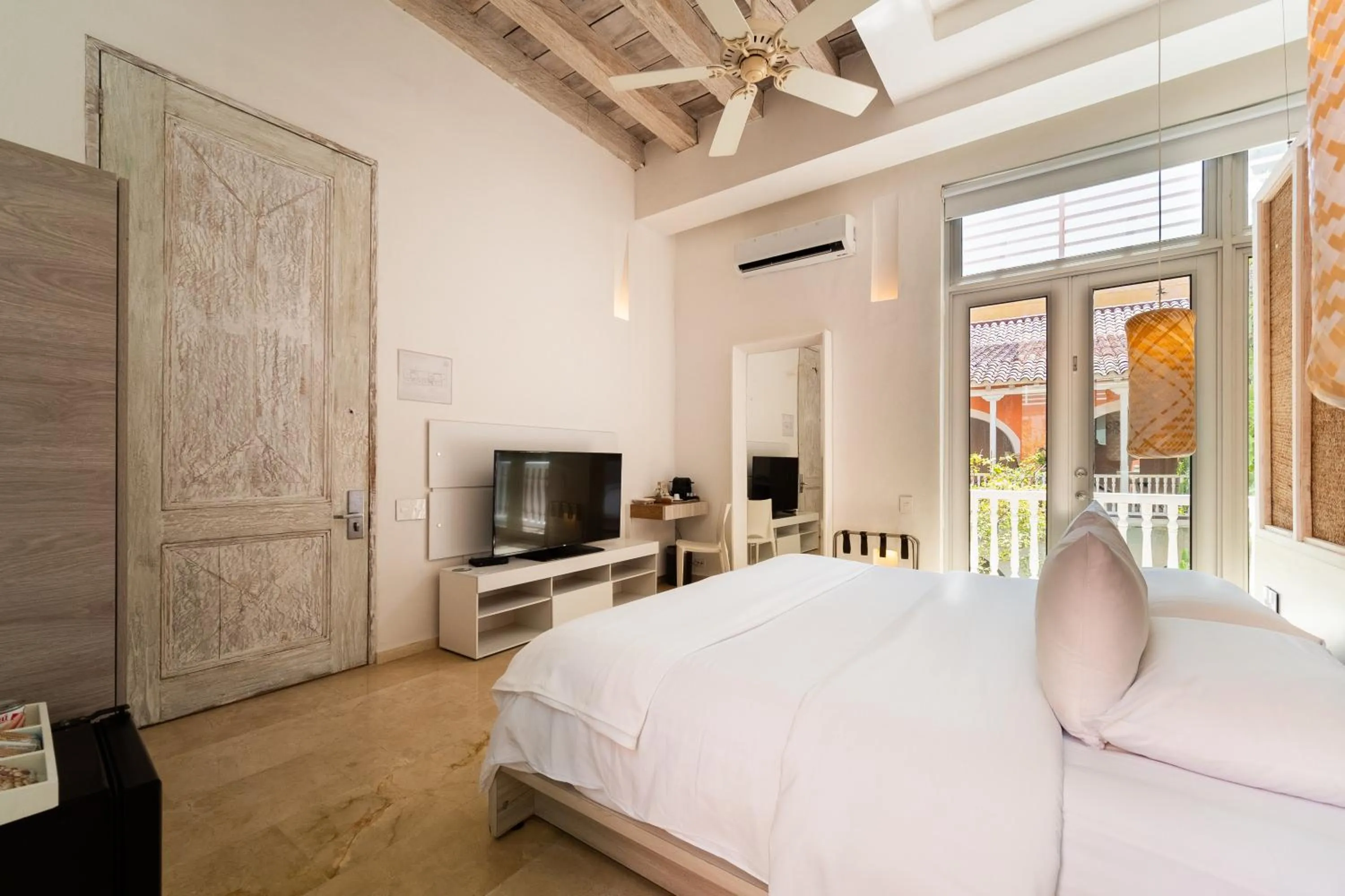 Photo of the whole room, Bed in Nacar Hotel Cartagena, Curio Collection by Hilton