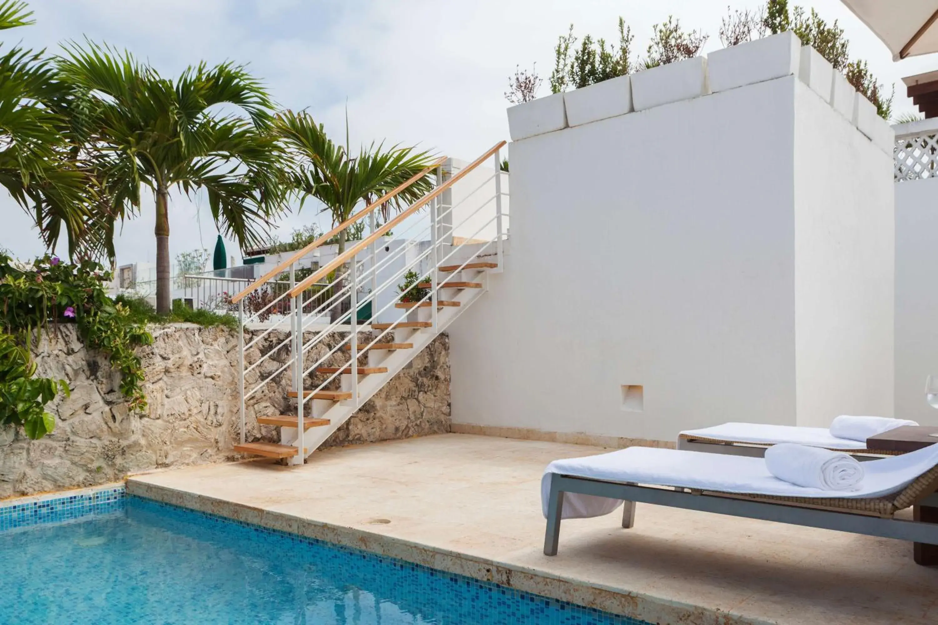 Pool view in Nacar Hotel Cartagena, Curio Collection by Hilton Pool view in Nacar Hotel Cartagena, Curio Collection by Hilton