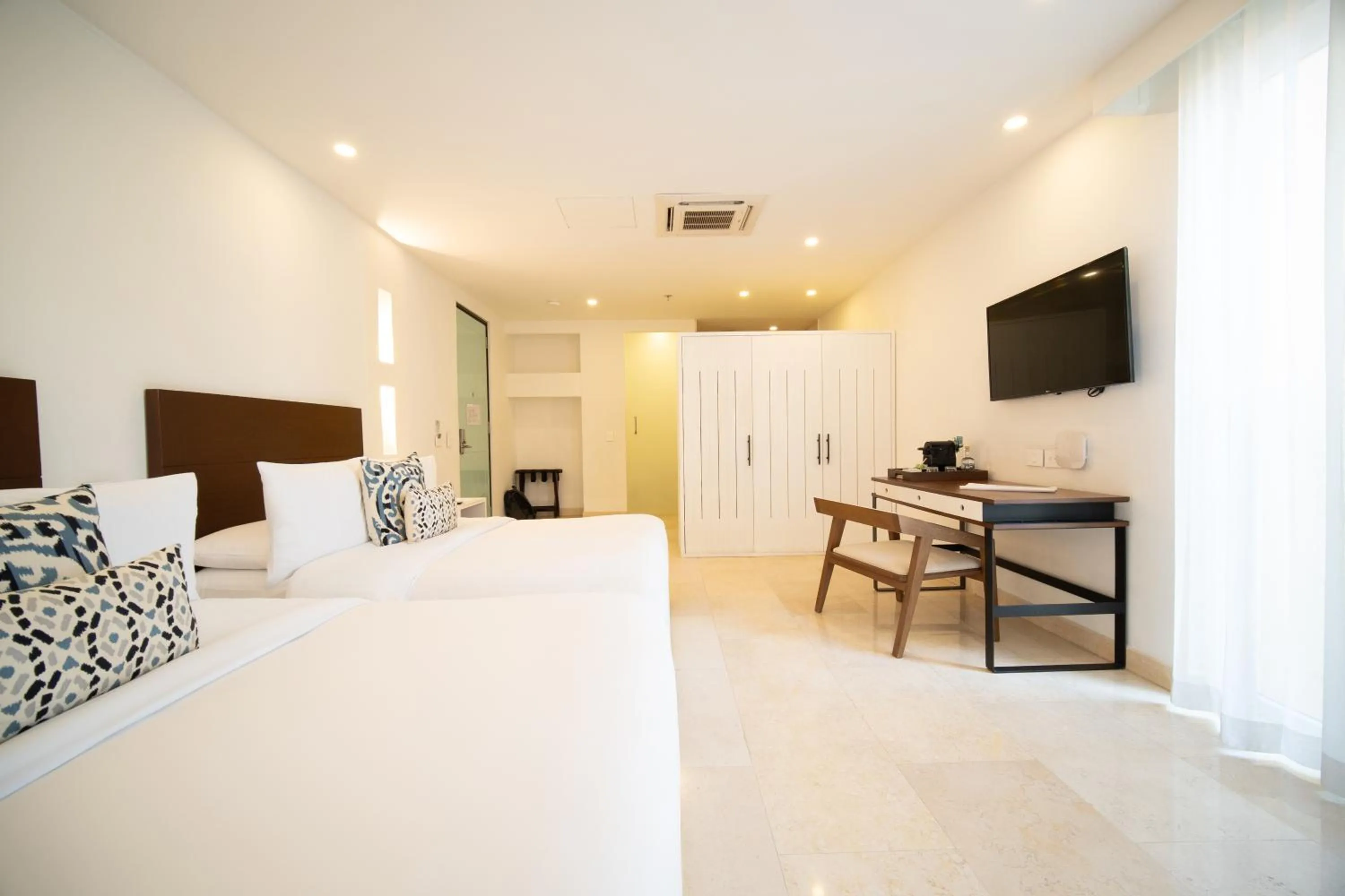 Photo of the whole room, Bed in Nacar Hotel Cartagena, Curio Collection by Hilton