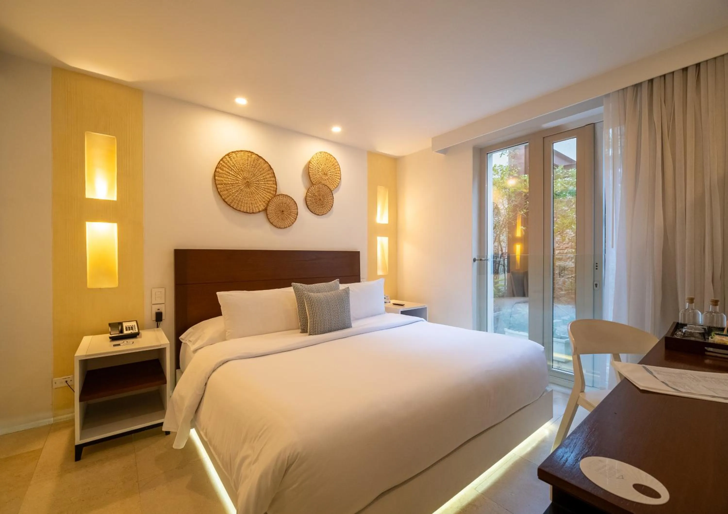 Bed in Nacar Hotel Cartagena, Curio Collection by Hilton