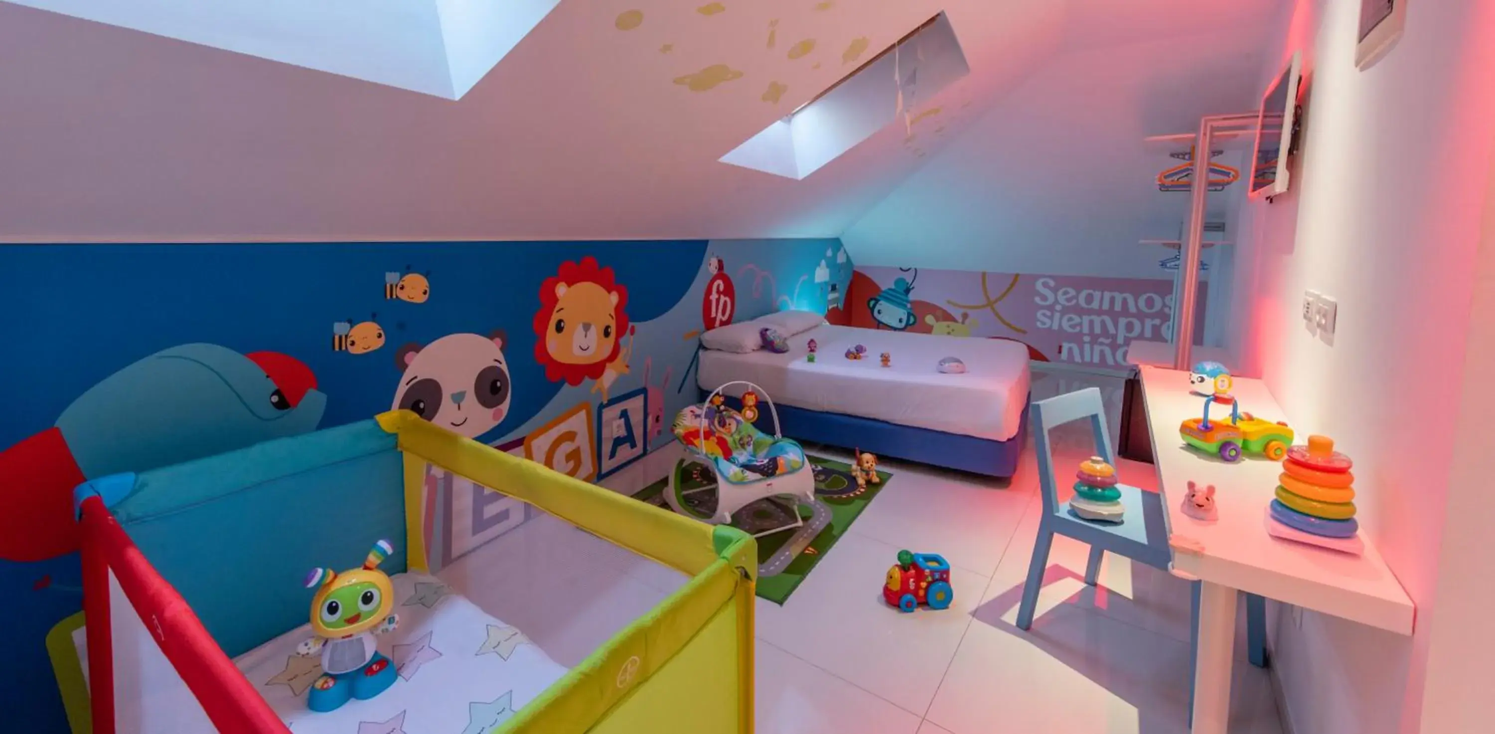 Bed in Hotel del Juguete Bed in Hotel del Juguete