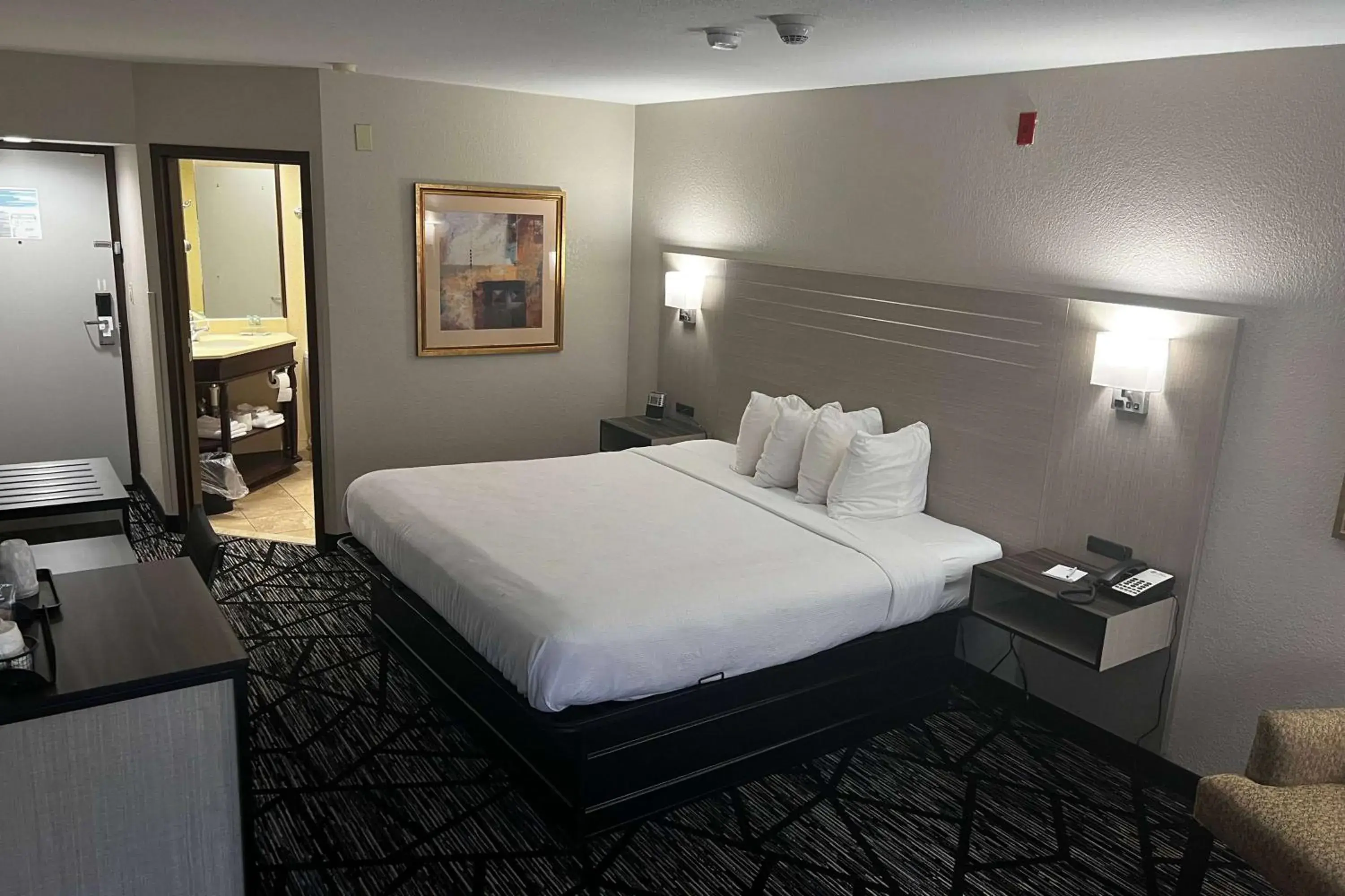 Photo of the whole room, Bed in Baymont By Wyndham Monroe Ohio Photo of the whole room, Bed in Baymont By Wyndham Monroe Ohio