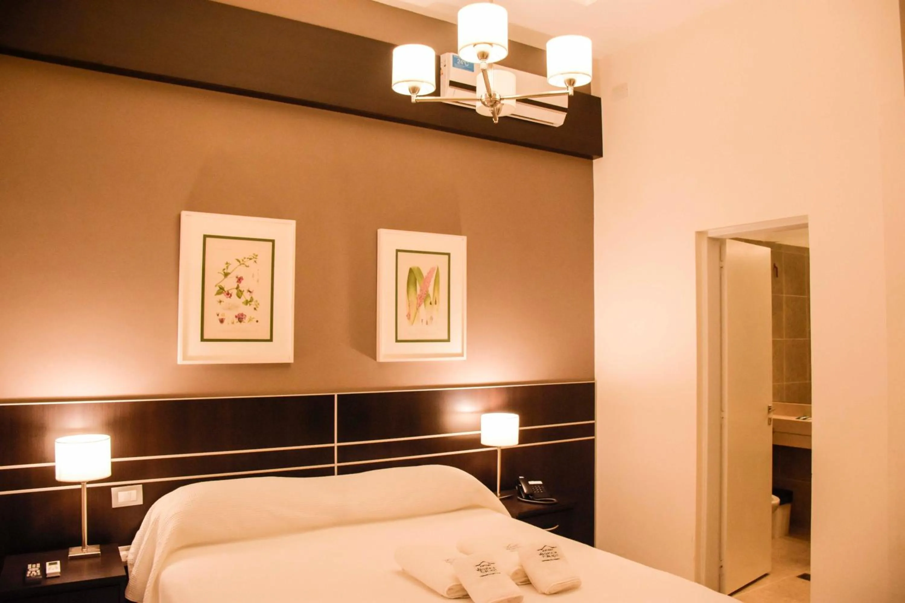 Bed in Hostería Atahualpa Yupanqui