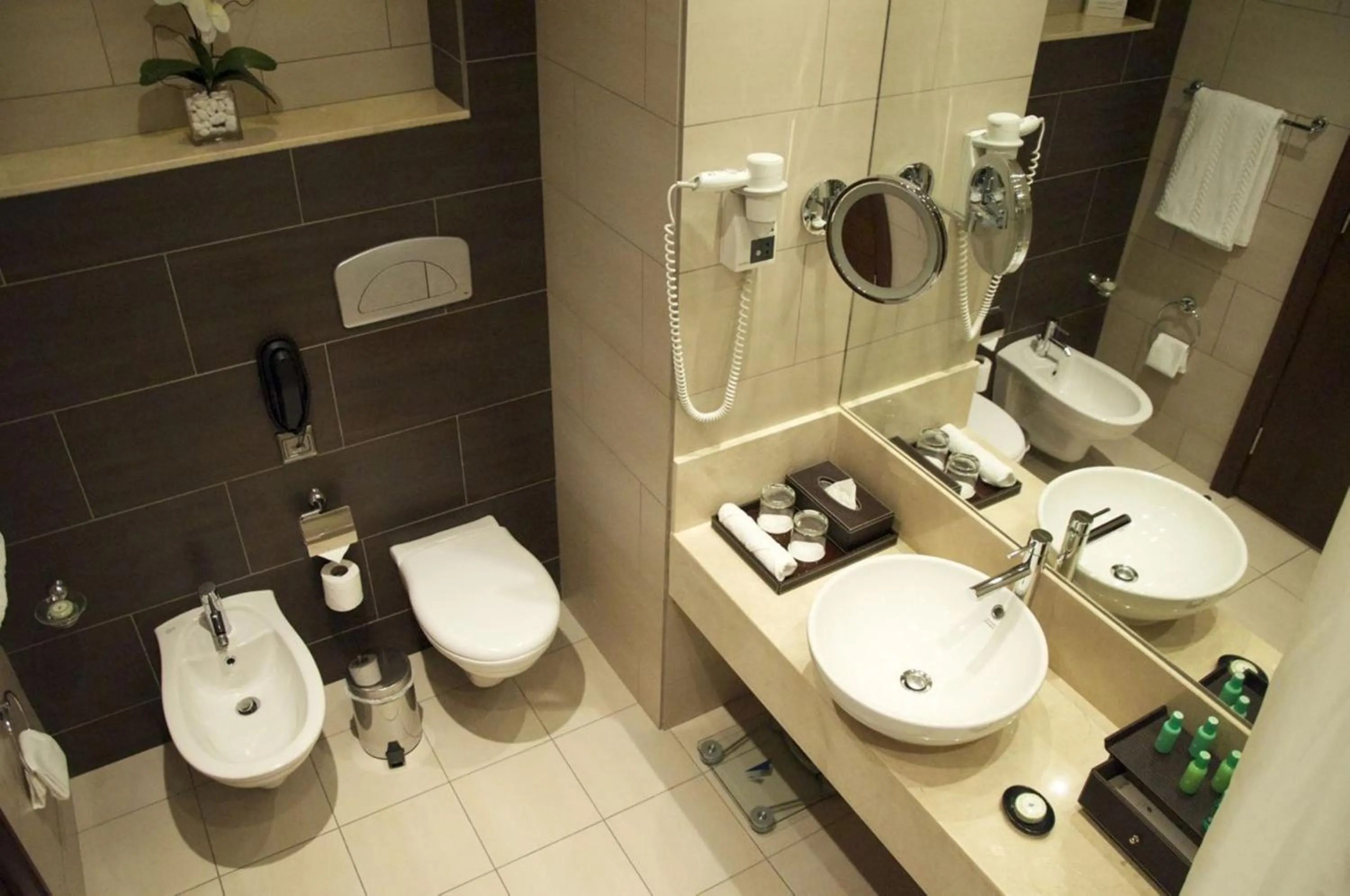 Bathroom in Ramada Downtown Abu Dhabi