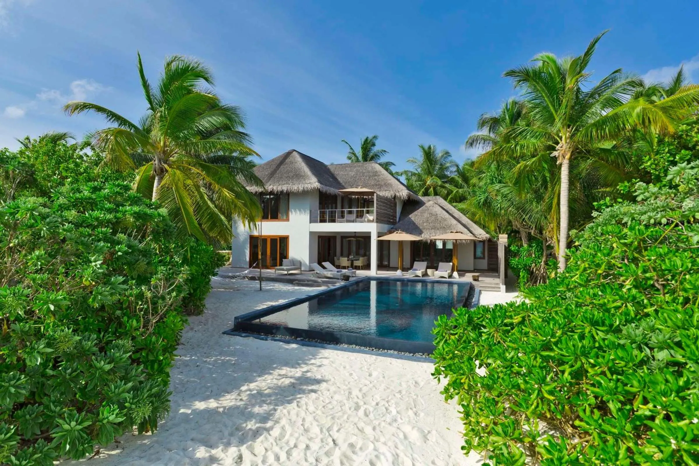 Bedroom in Dusit Thani Maldives - 50 percent discount on transfers for stays until 20 Dec 2025