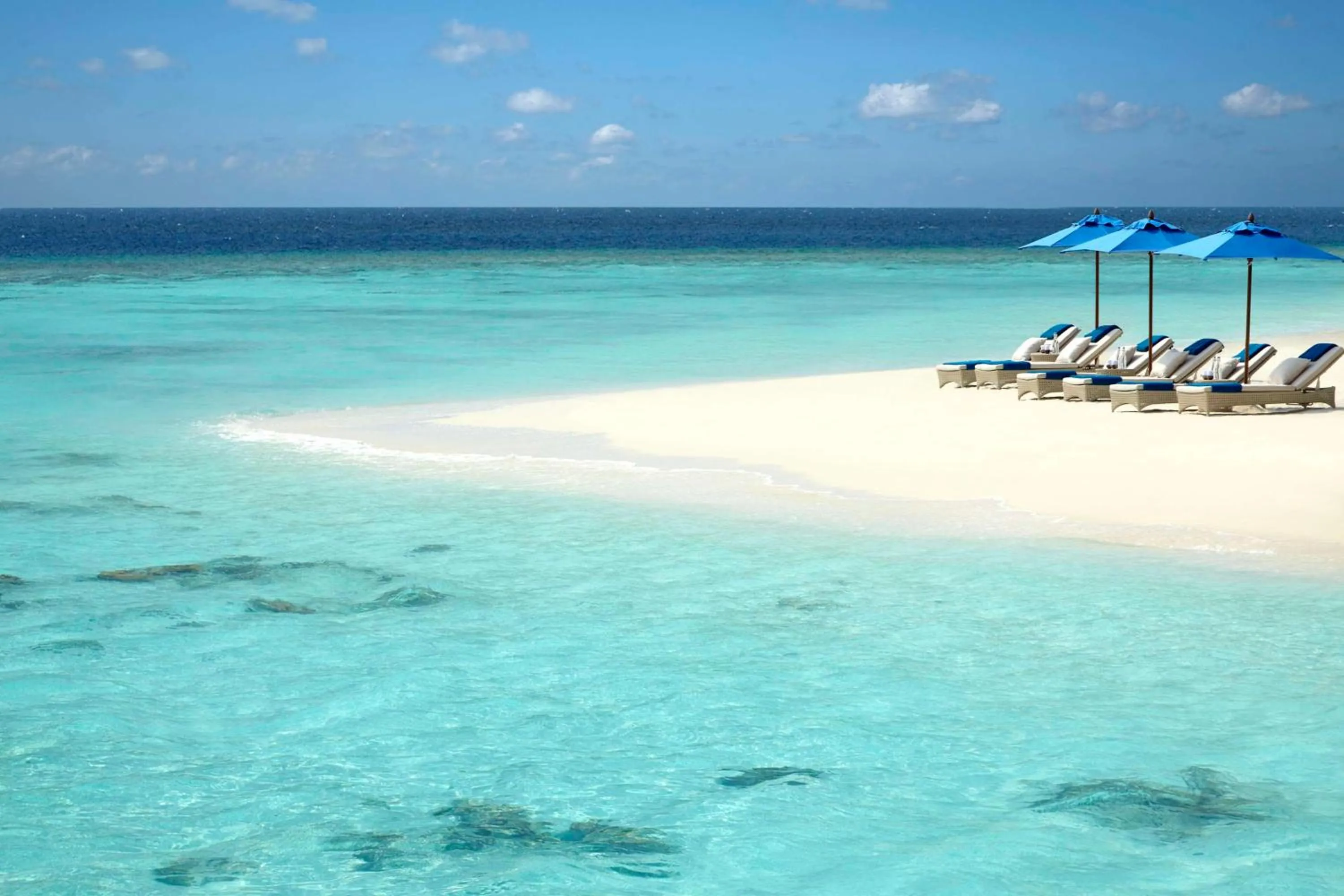 Beach in Dusit Thani Maldives - 50 percent discount on transfers for stays until 20 Dec 2025