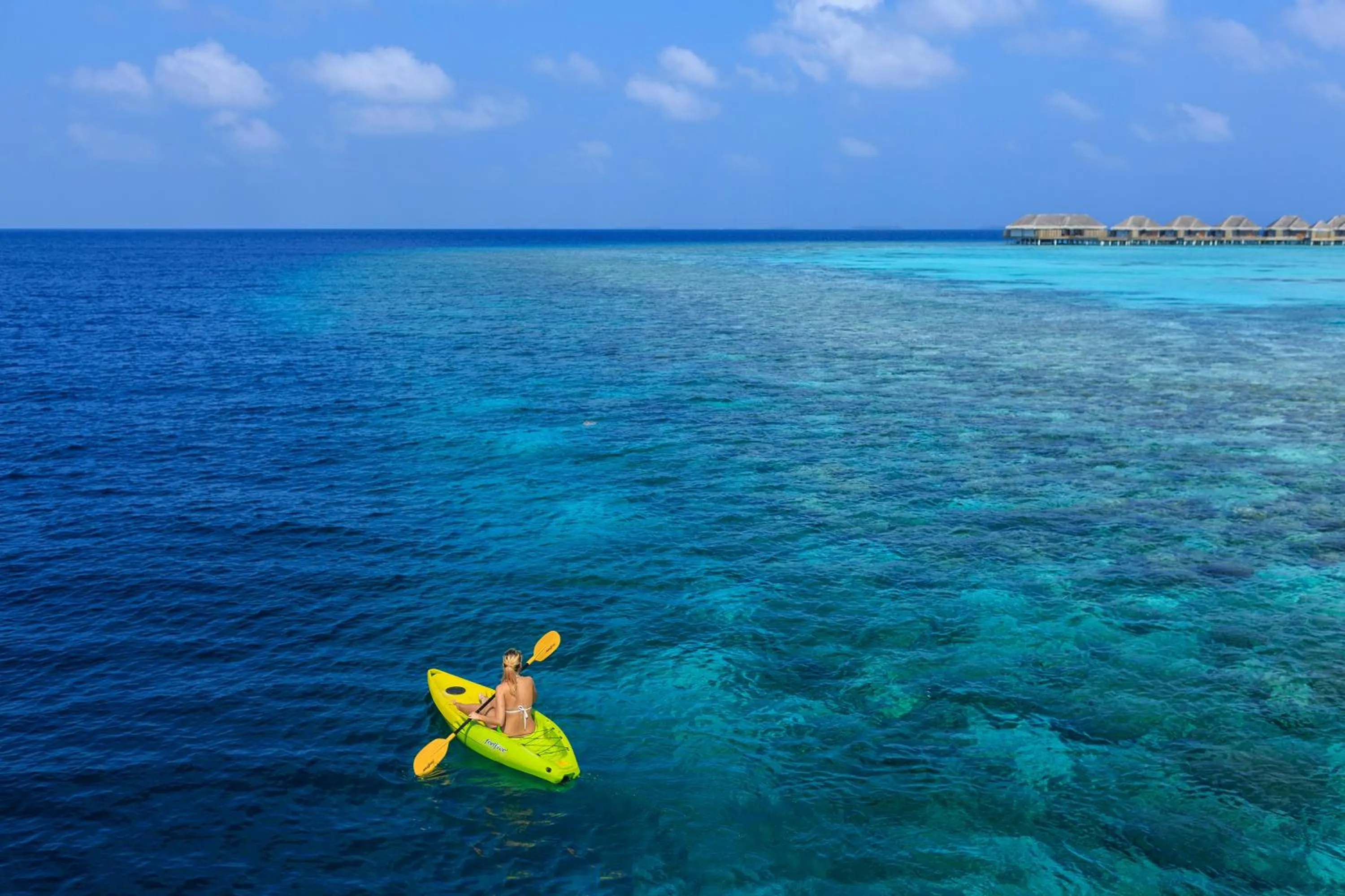 Canoeing in Dusit Thani Maldives - 50 percent discount on transfers for stays until 20 Dec 2025