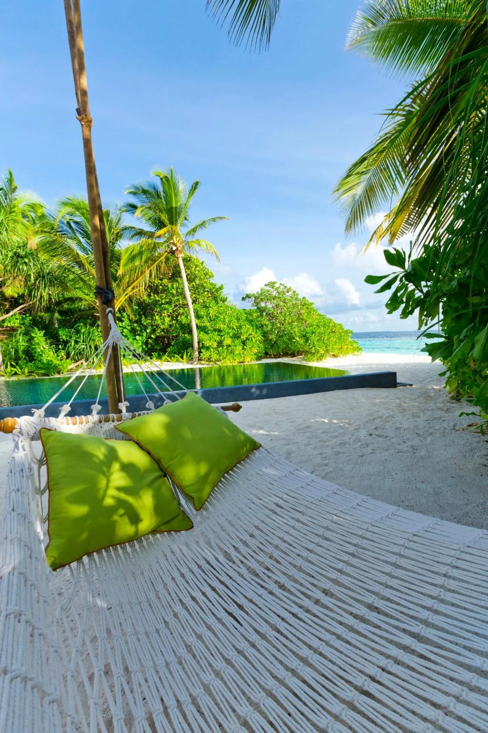 Beach in Dusit Thani Maldives - 50 percent discount on transfers for stays until 20 Dec 2025