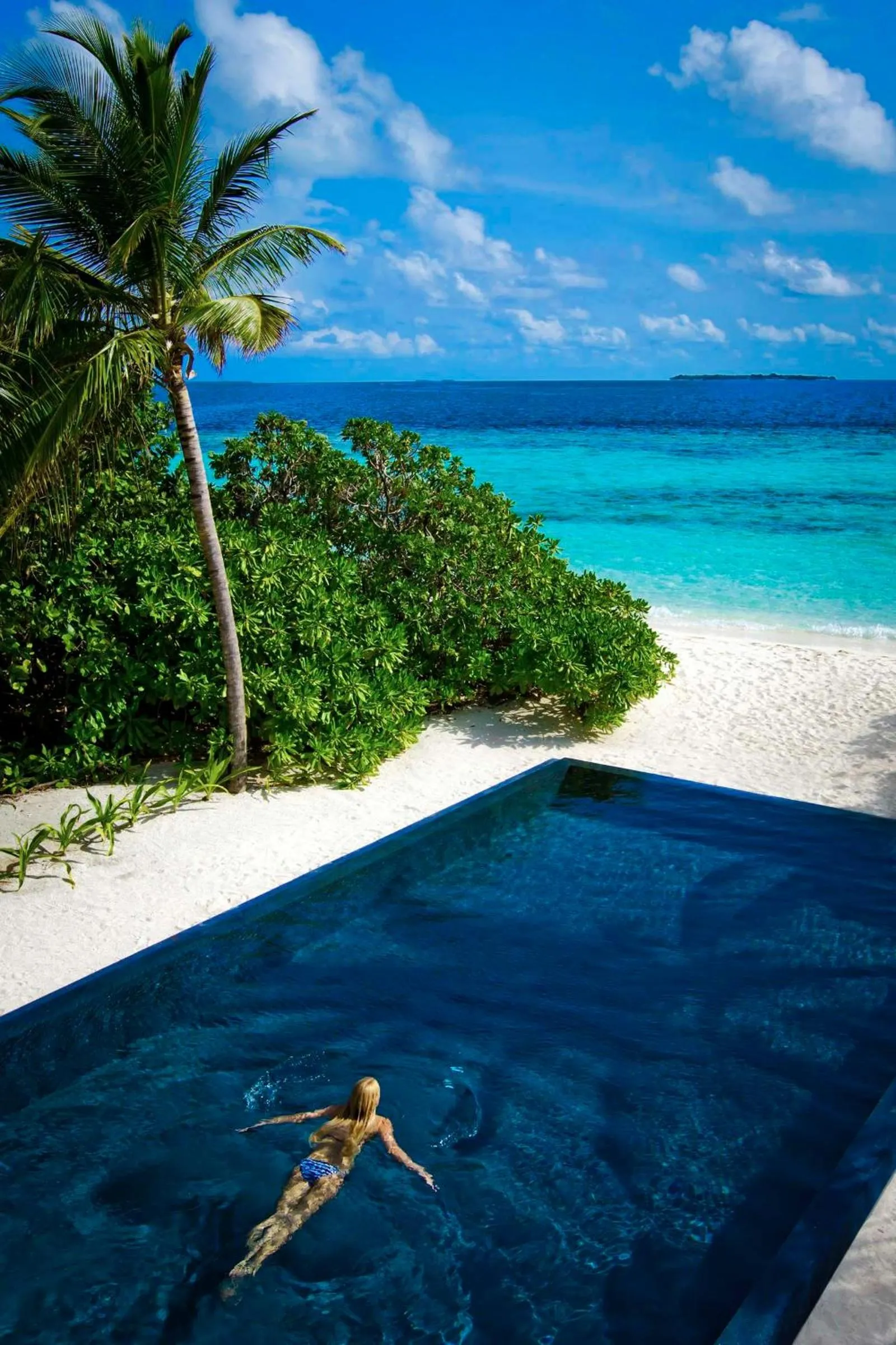 Beach in Dusit Thani Maldives - 50 percent discount on transfers for stays until 20 Dec 2025