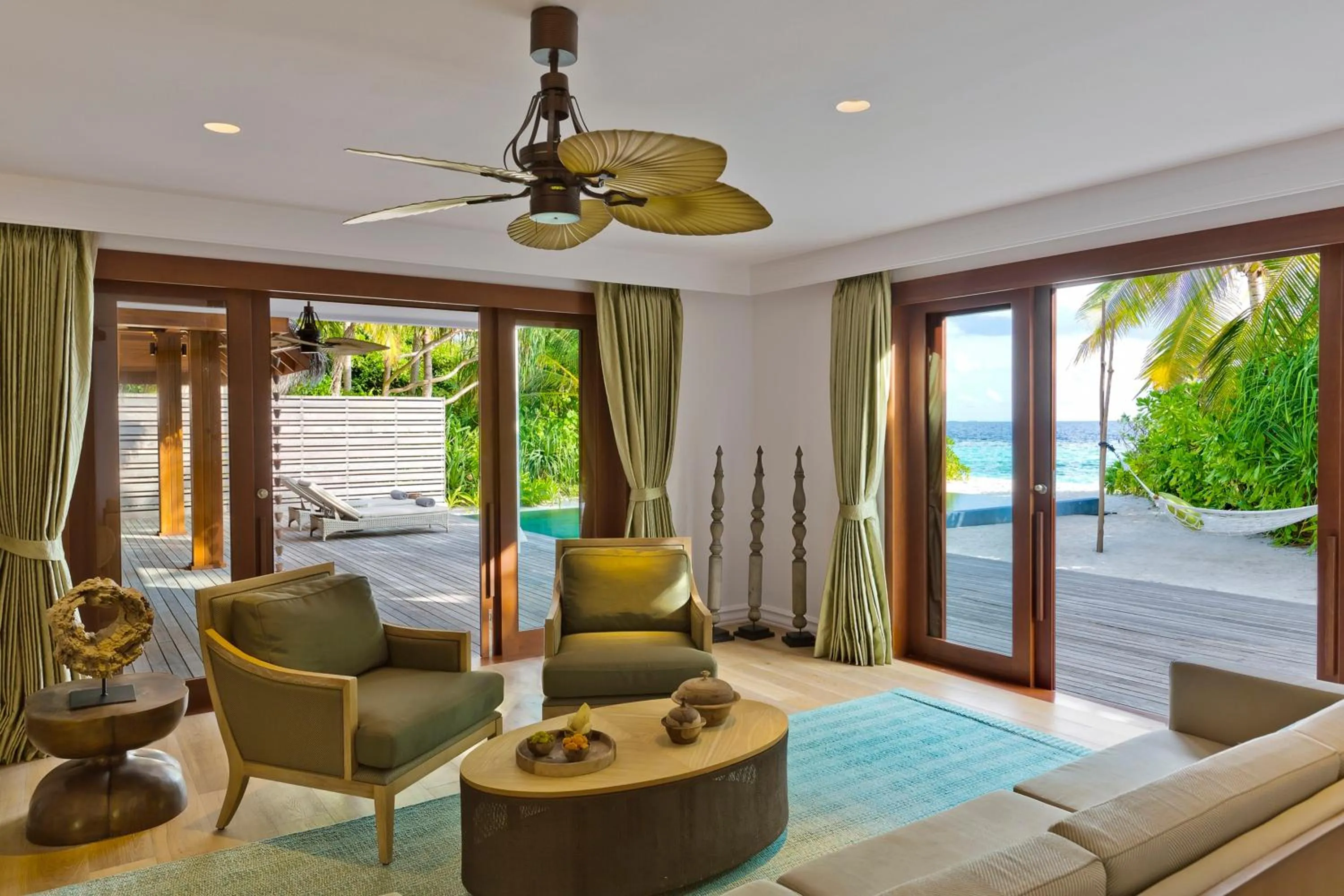 Living room in Dusit Thani Maldives - 50 percent discount on transfers for stays until 20 Dec 2025