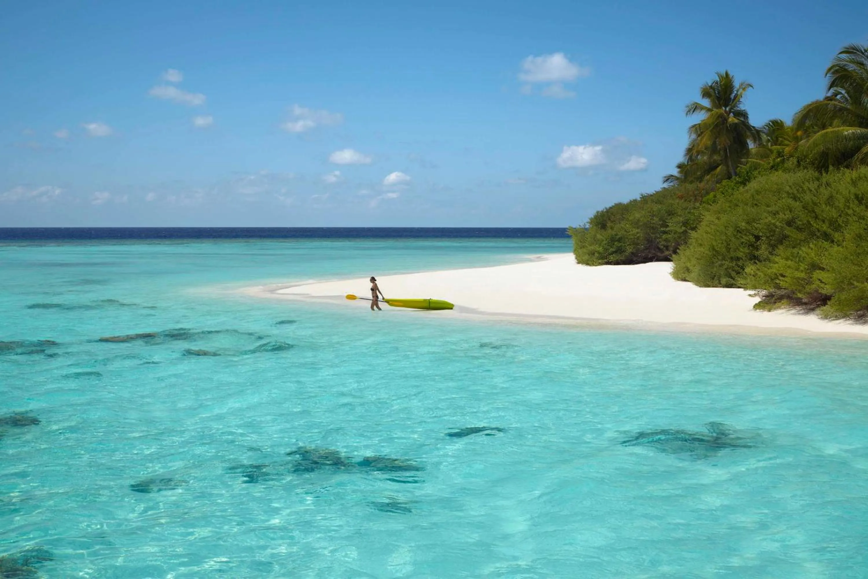 Beach in Dusit Thani Maldives - 50 percent discount on transfers for stays until 20 Dec 2025