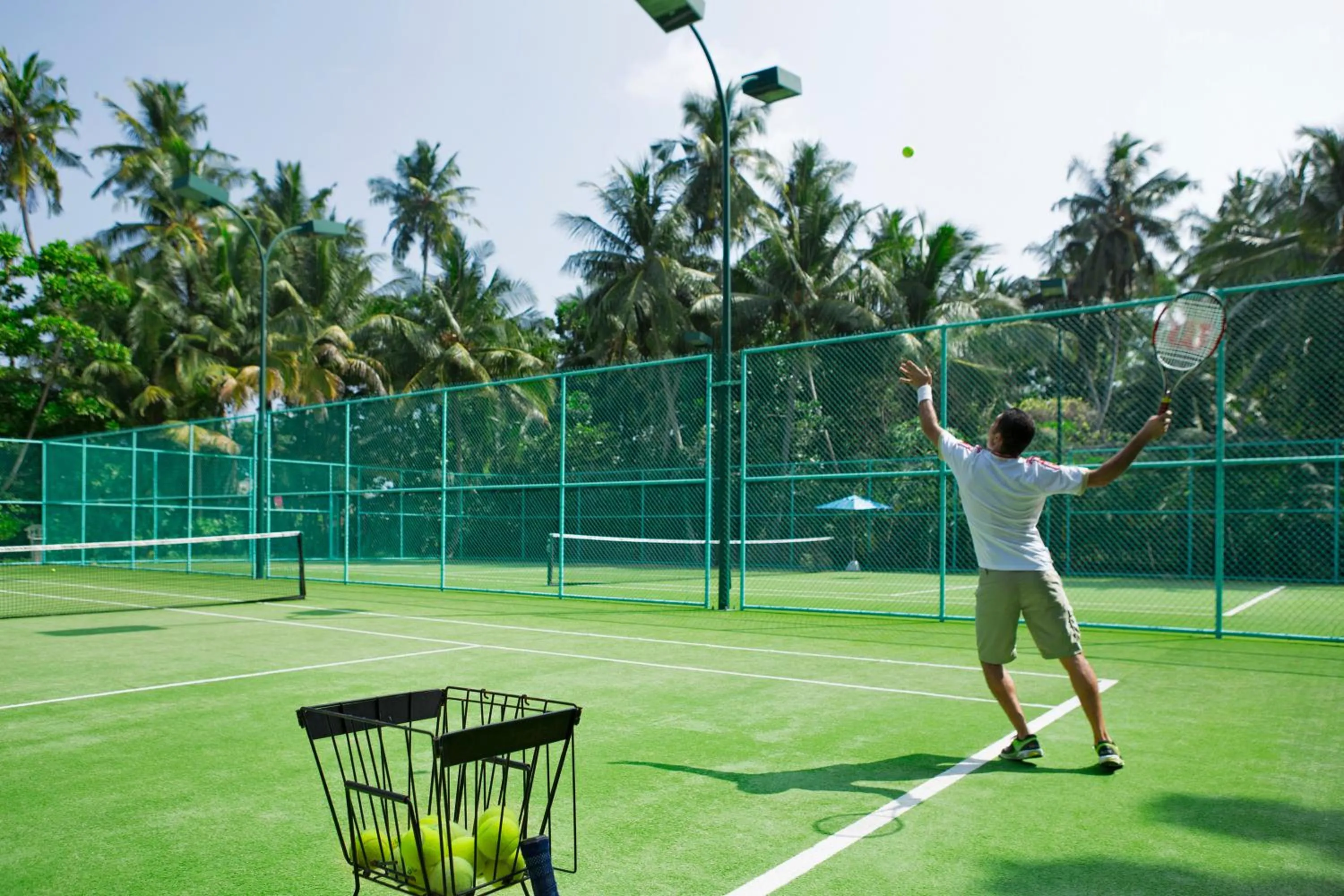 Tennis court in Dusit Thani Maldives - 50 percent discount on transfers for stays until 20 Dec 2025