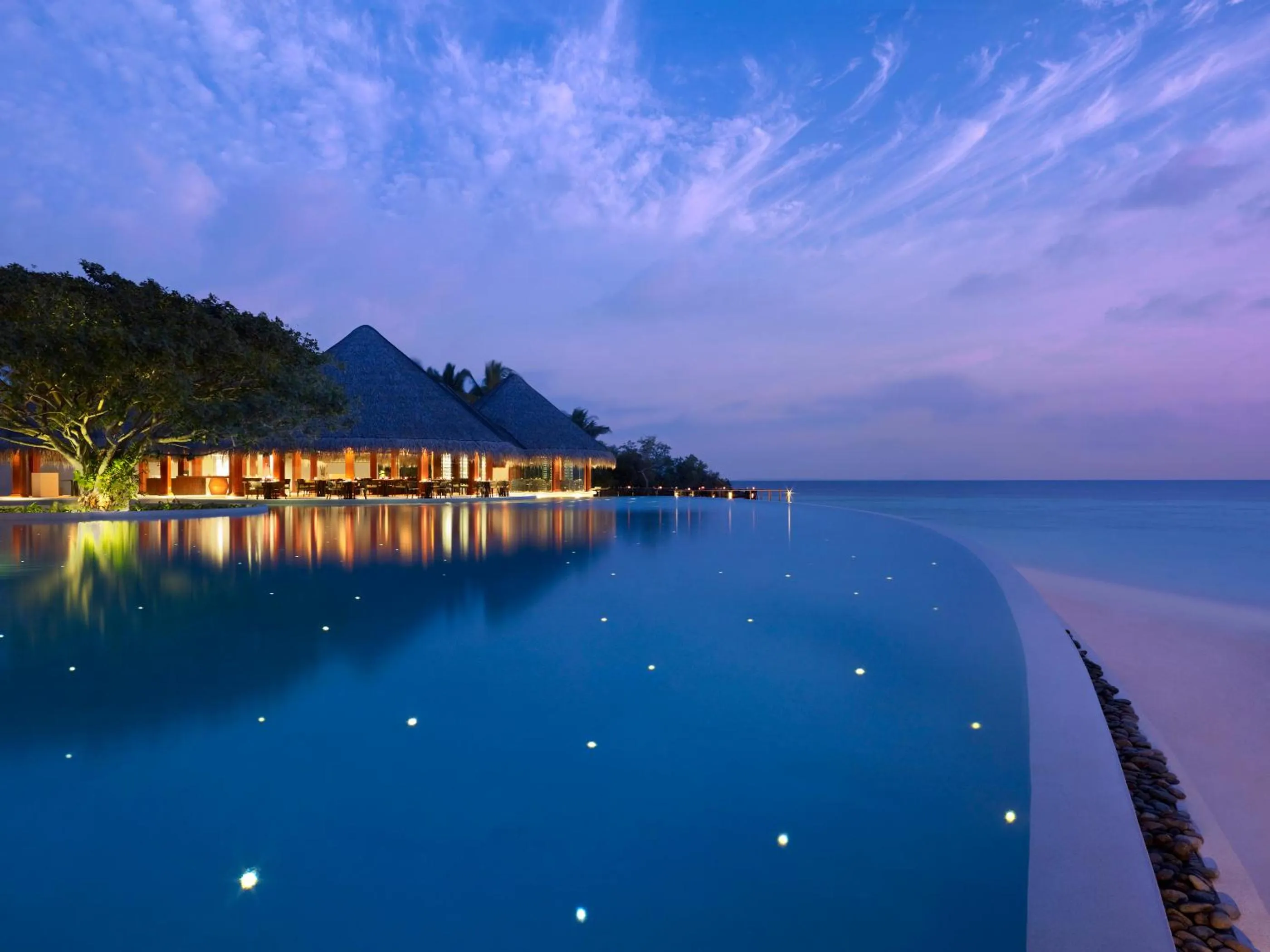 Swimming pool in Dusit Thani Maldives - 50 percent discount on transfers for stays until 20 Dec 2025