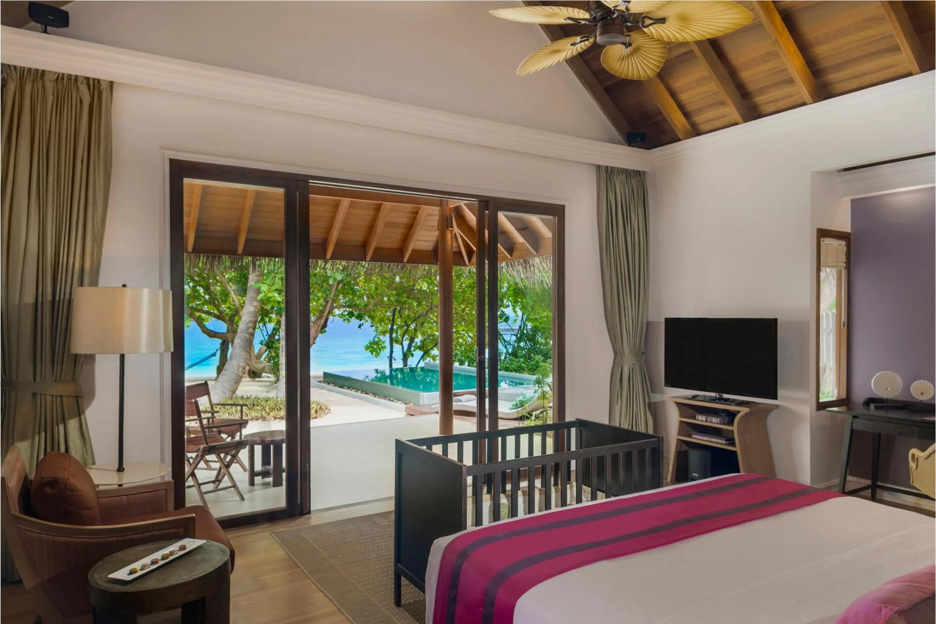 Bed in Dusit Thani Maldives - 50 percent discount on transfers for stays until 20 Dec 2025