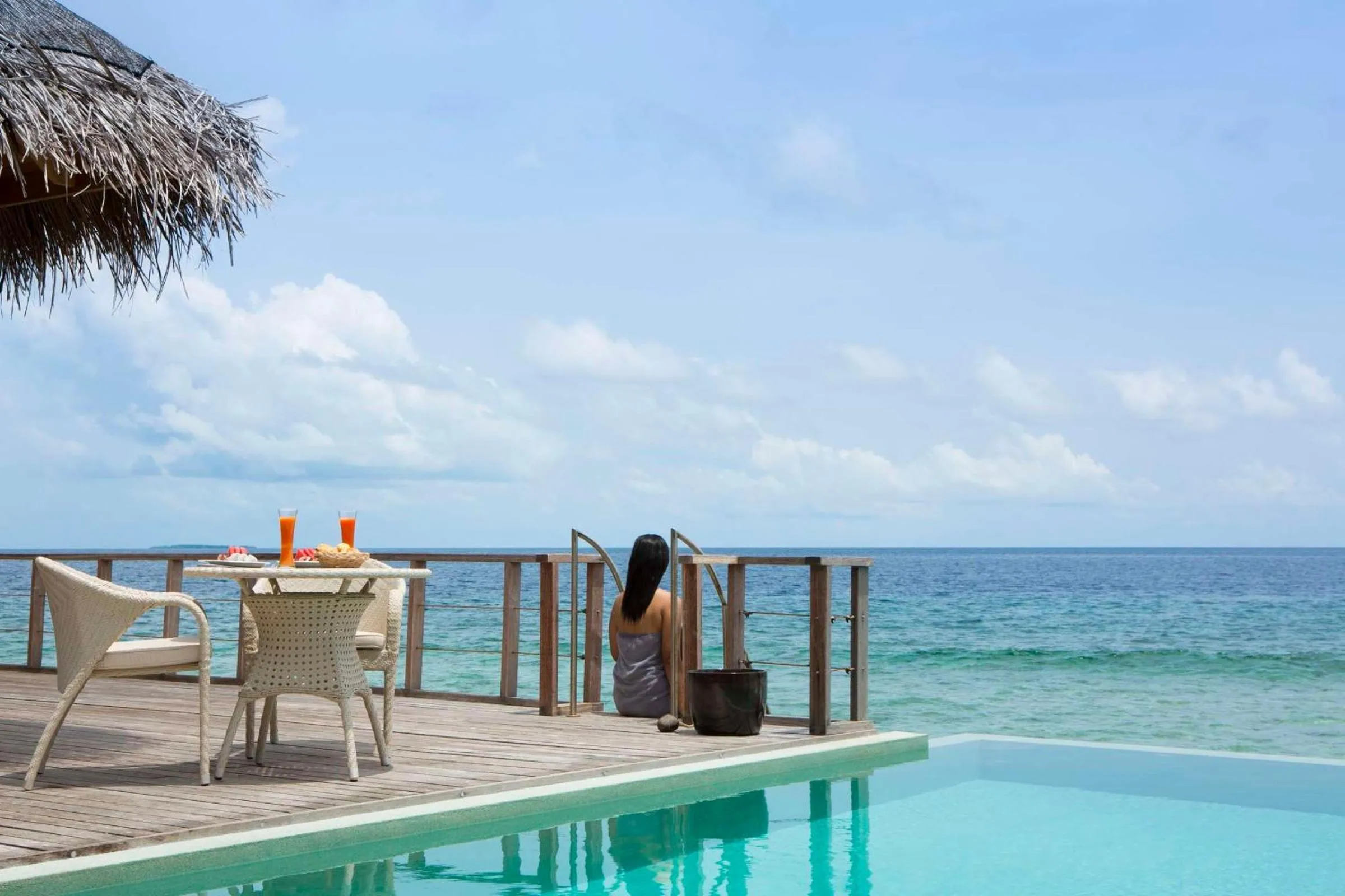 Bedroom in Dusit Thani Maldives - 50 percent discount on transfers for stays until 20 Dec 2025