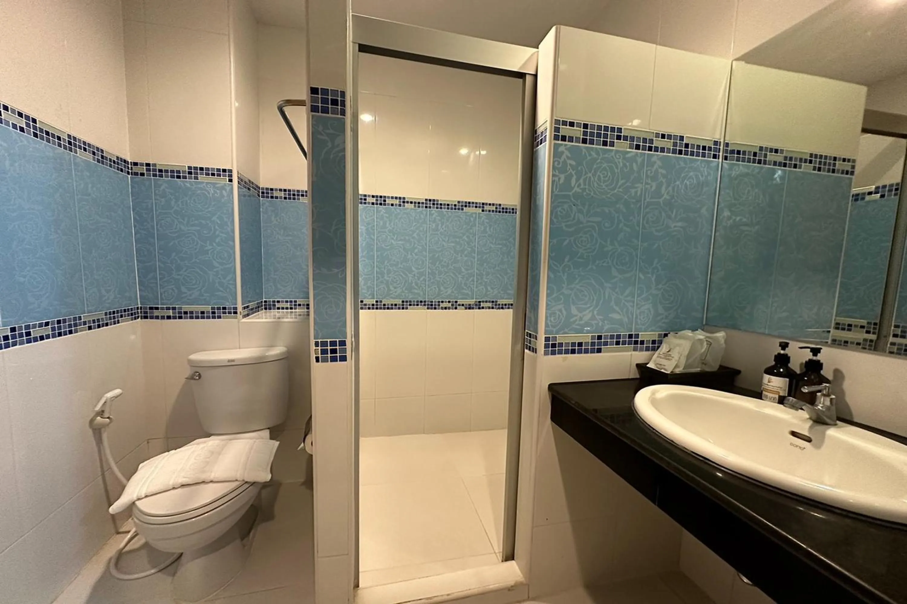 Bathroom in Chiangrai Grand Room Hotel