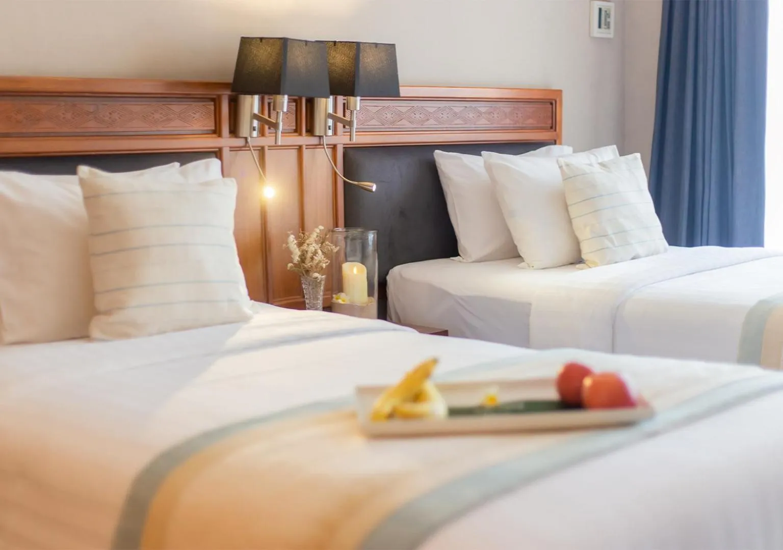 Bed in Tohsang Heritage Ubon Hotel