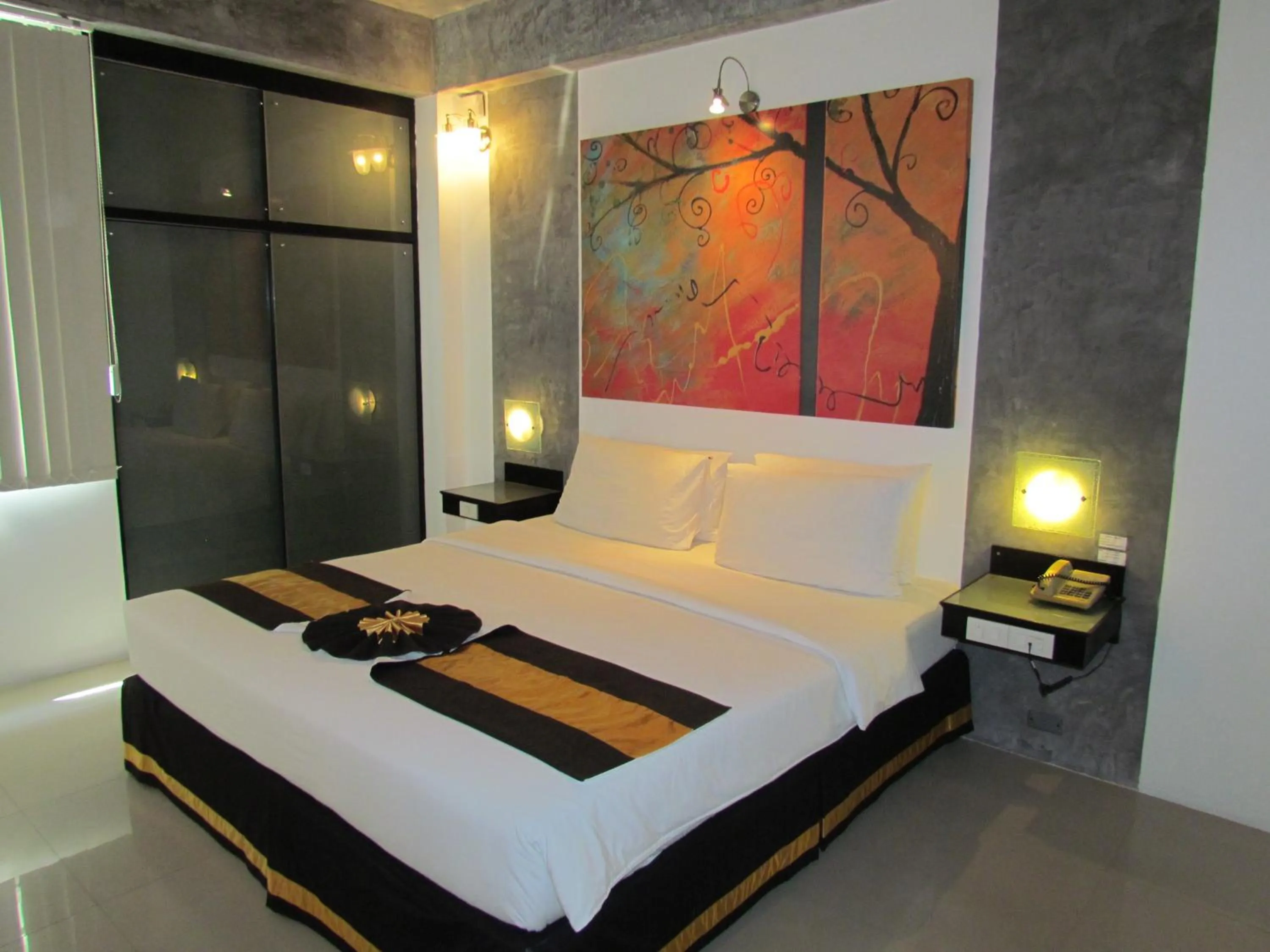 Bed in The Front Hotel and Apartments