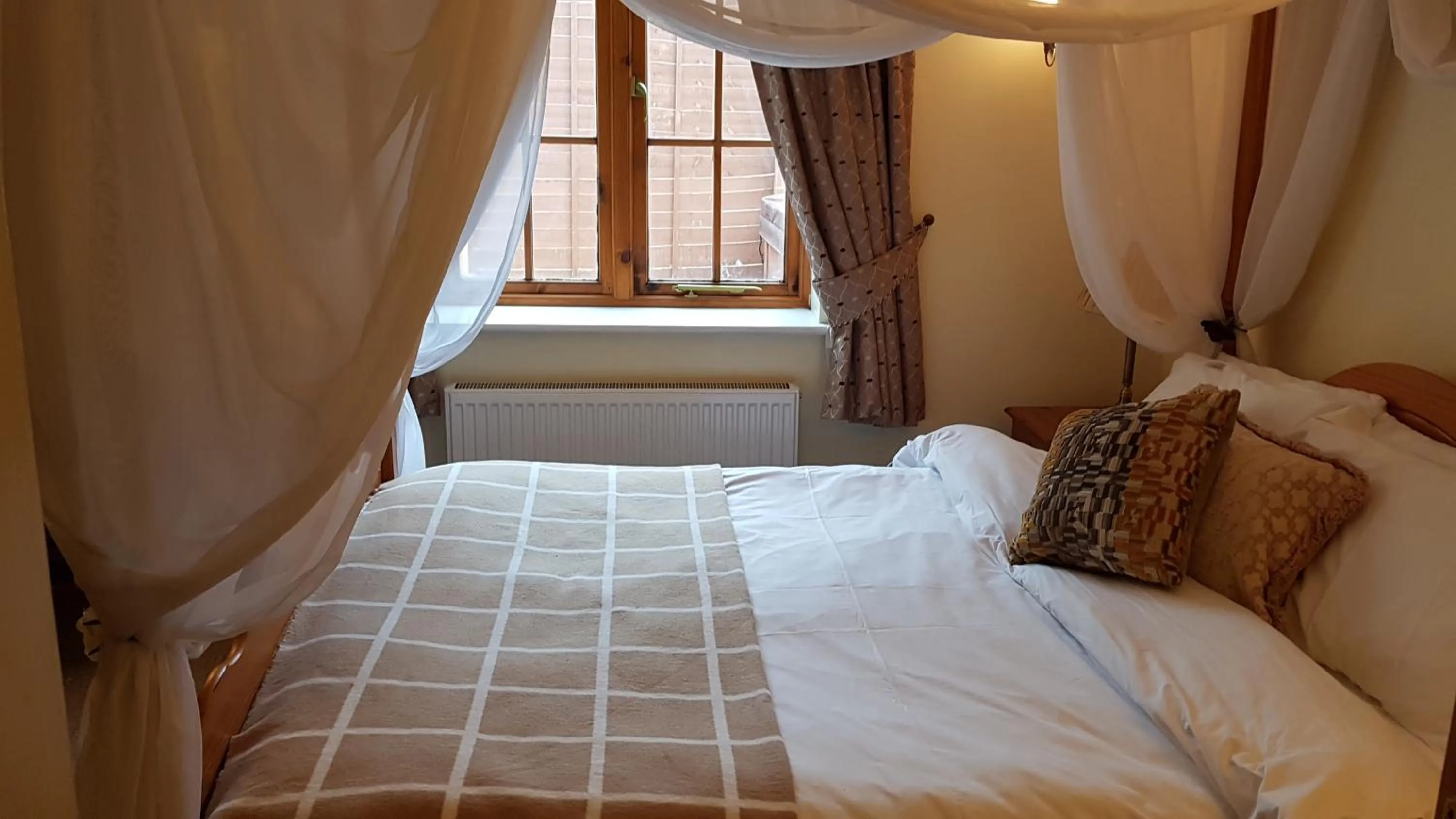 Bedroom in Sands Farm Cottages