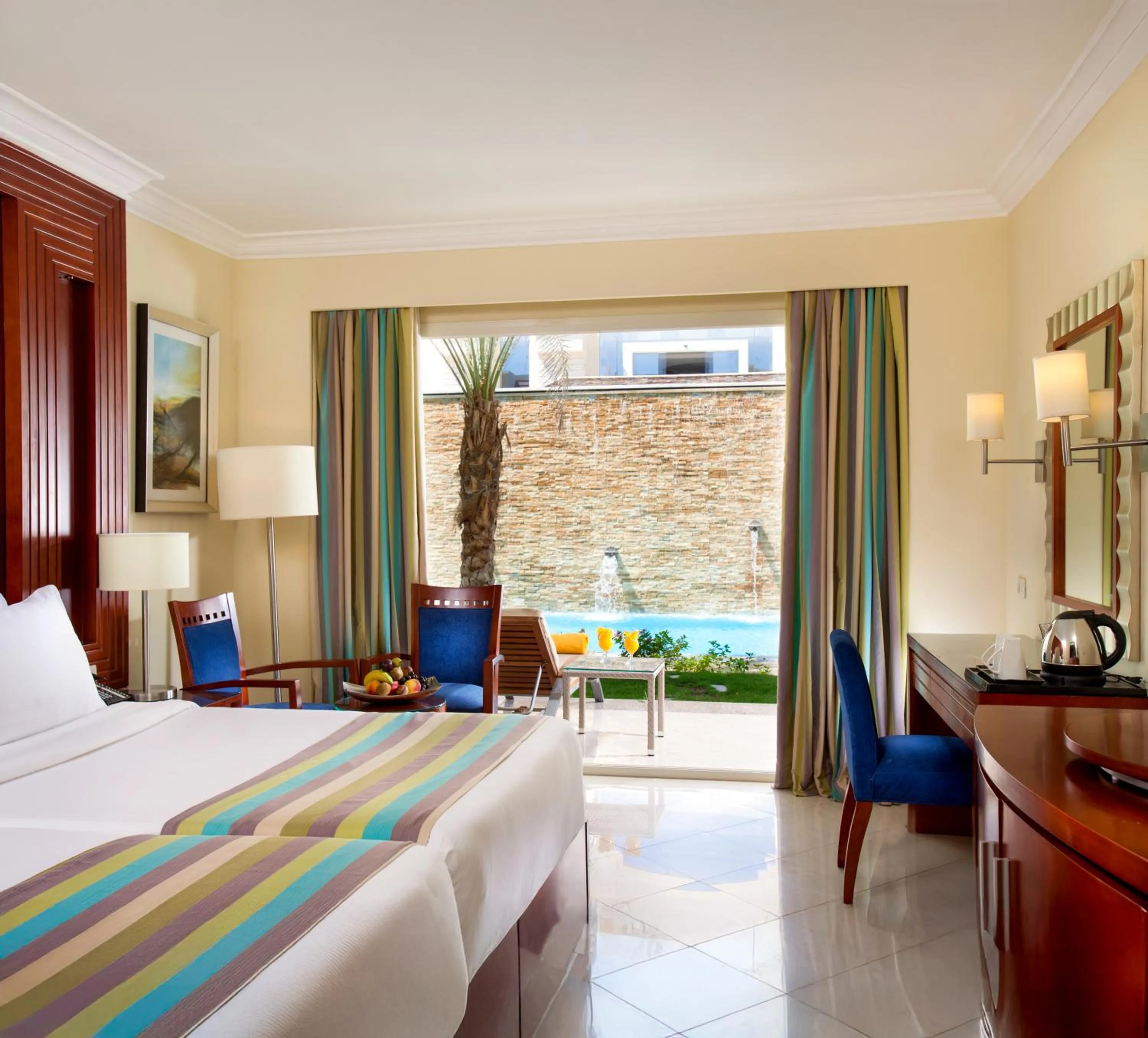 Bed in Xperience Sea Breeze Resort