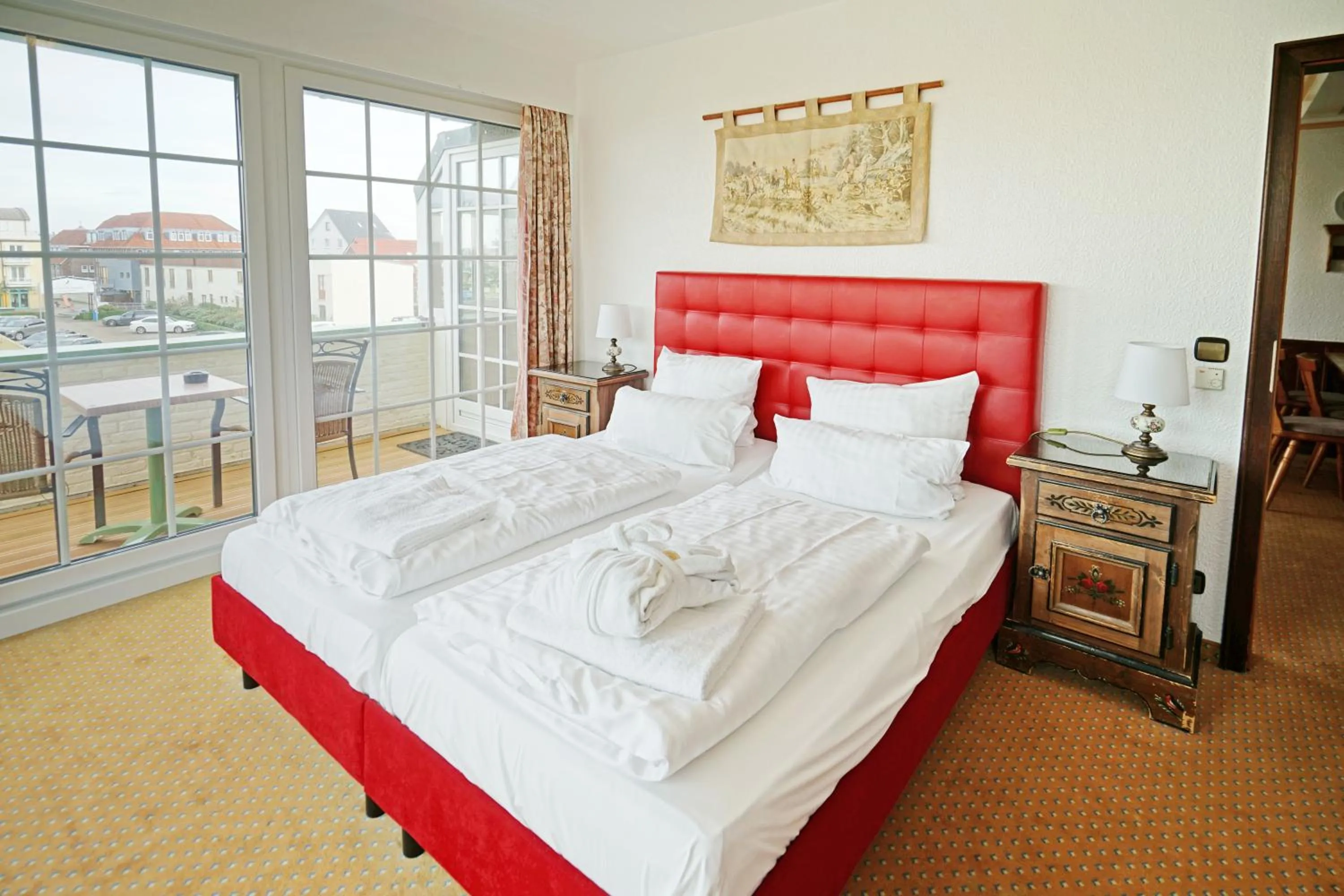 Bedroom, Bed in Hotel Appartement Landhaus Stutzi - Hotel Strandperle