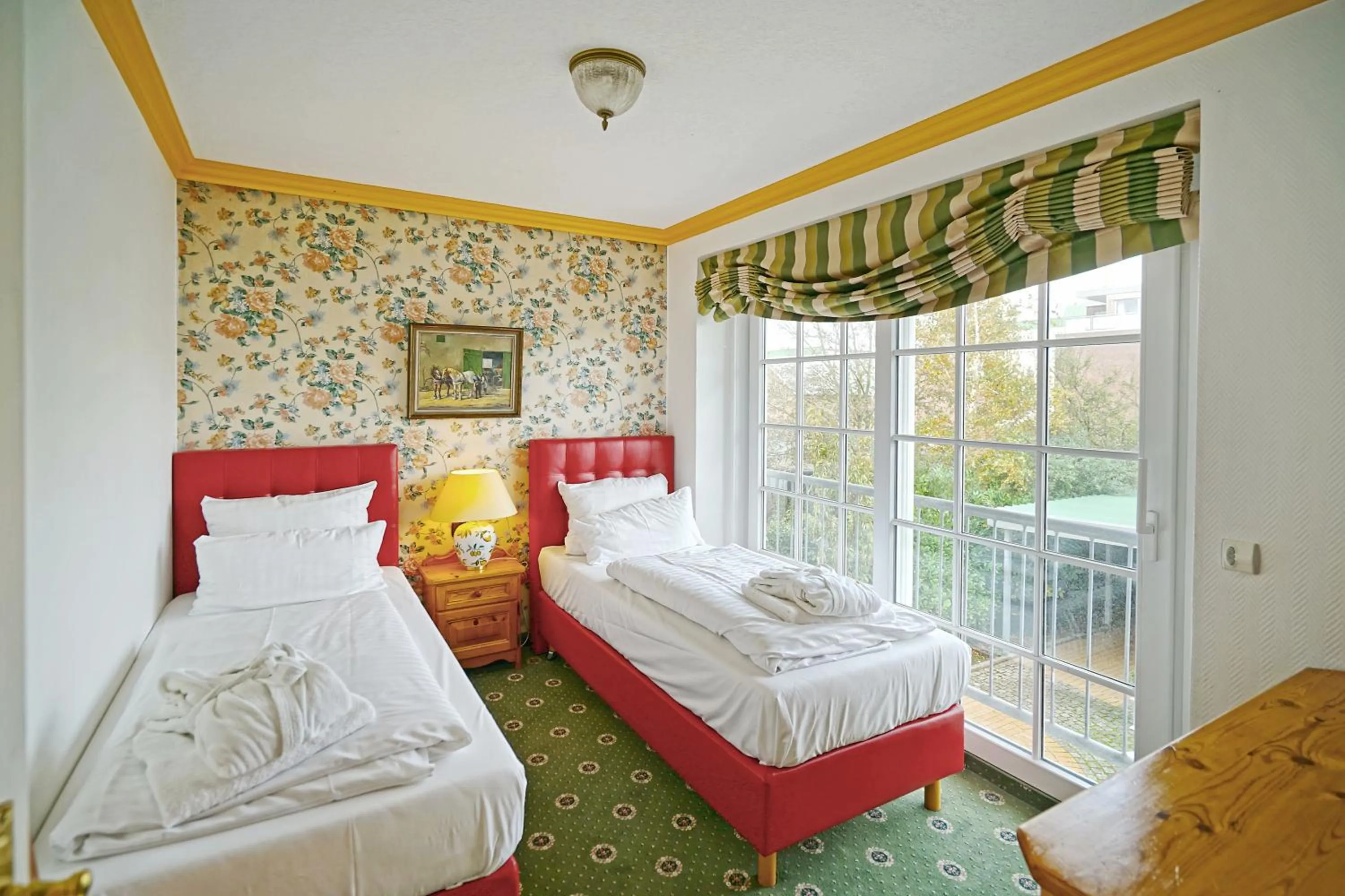 Bedroom, Bed in Hotel Appartement Landhaus Stutzi - Hotel Strandperle