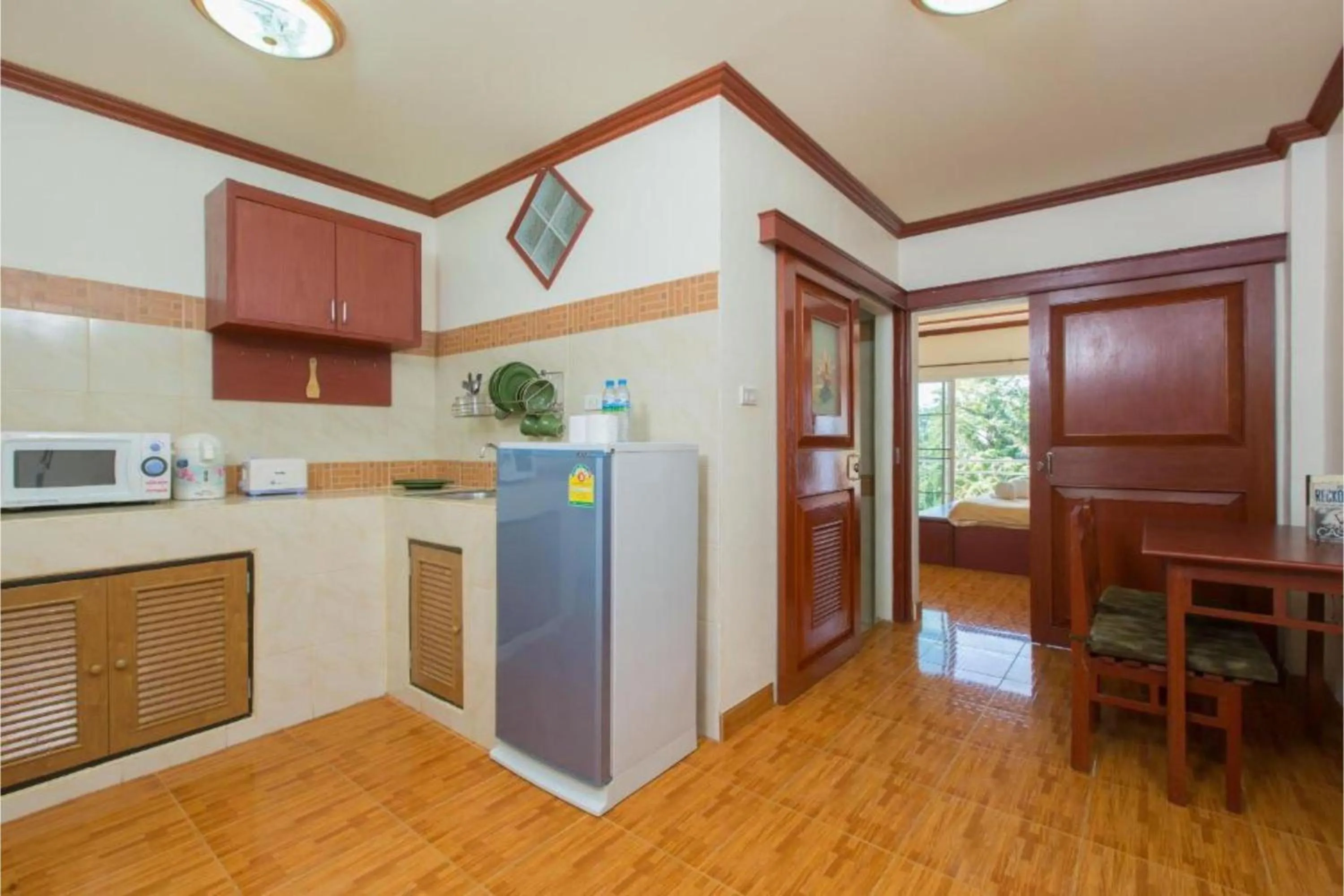 Kitchen or kitchenette in Patong Rai Rom Yen Resort SHA