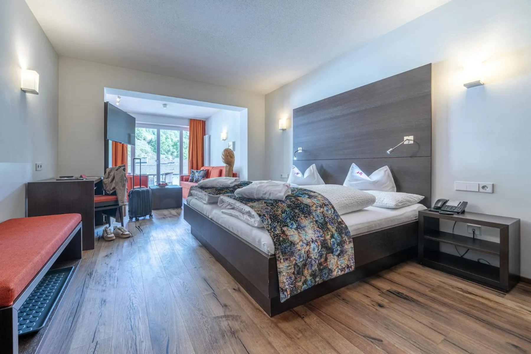 Living room, Bed in Alpin Art & Spa Hotel Naudererhof Superior