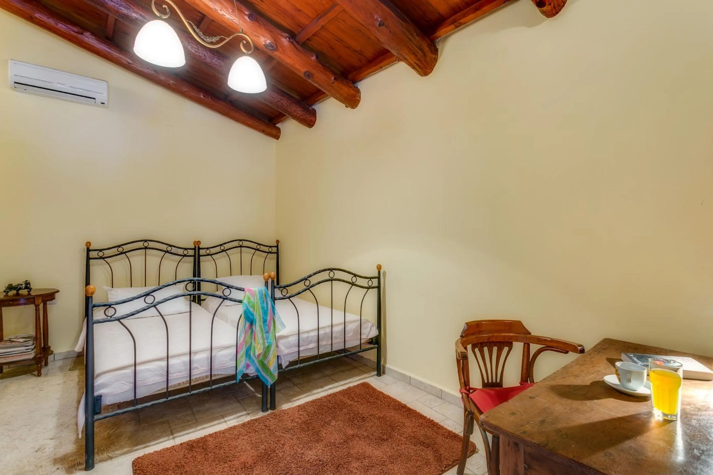 Bed in Ifigenia Theriso Village