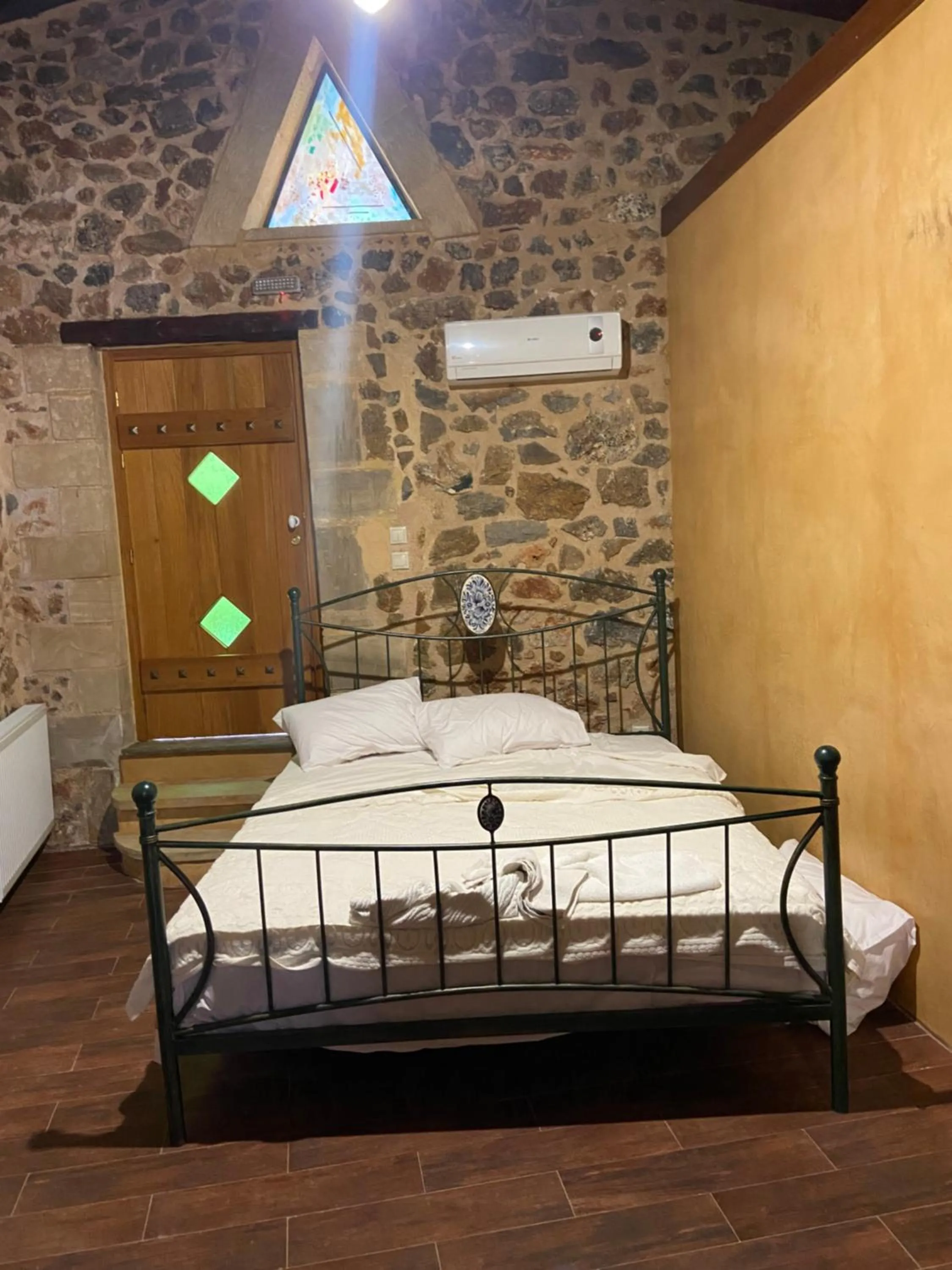 Bed in Ifigenia Theriso Village