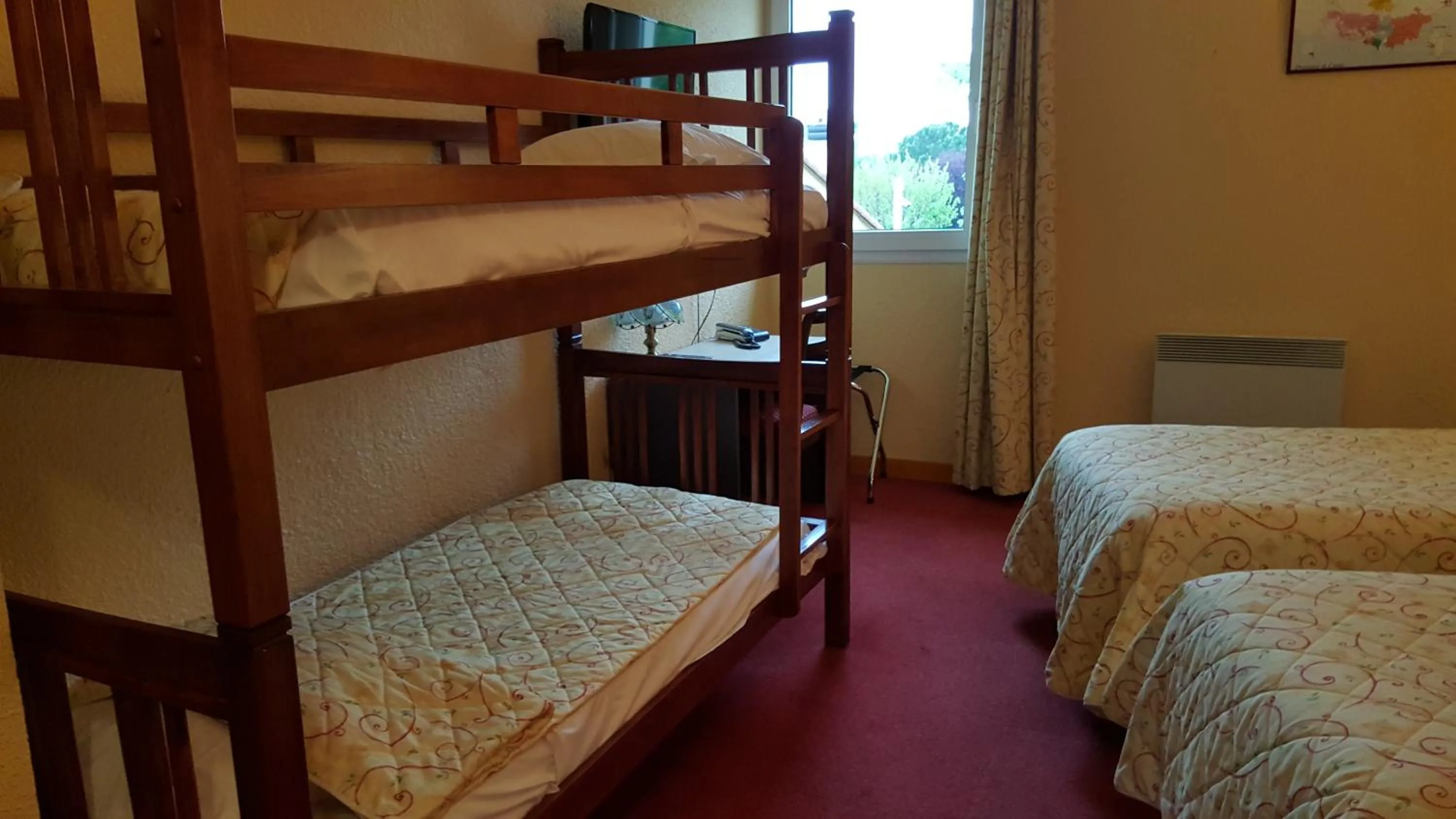 Bed in Hotel Restaurant La Martiniere