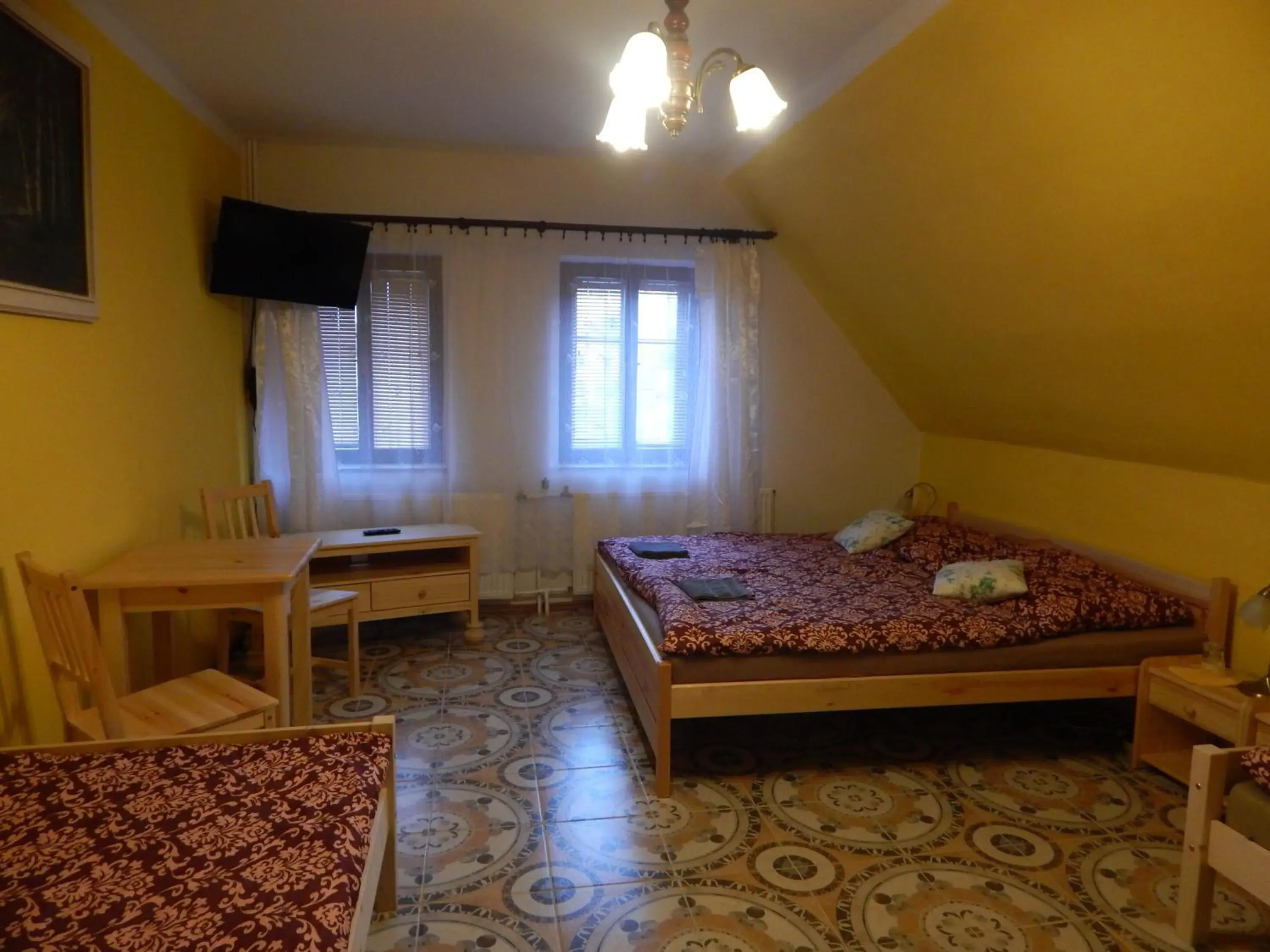 Quadruple Room - single occupancy in Penzion Dřevěnka Quadruple Room - single occupancy in Penzion Dřevěnka