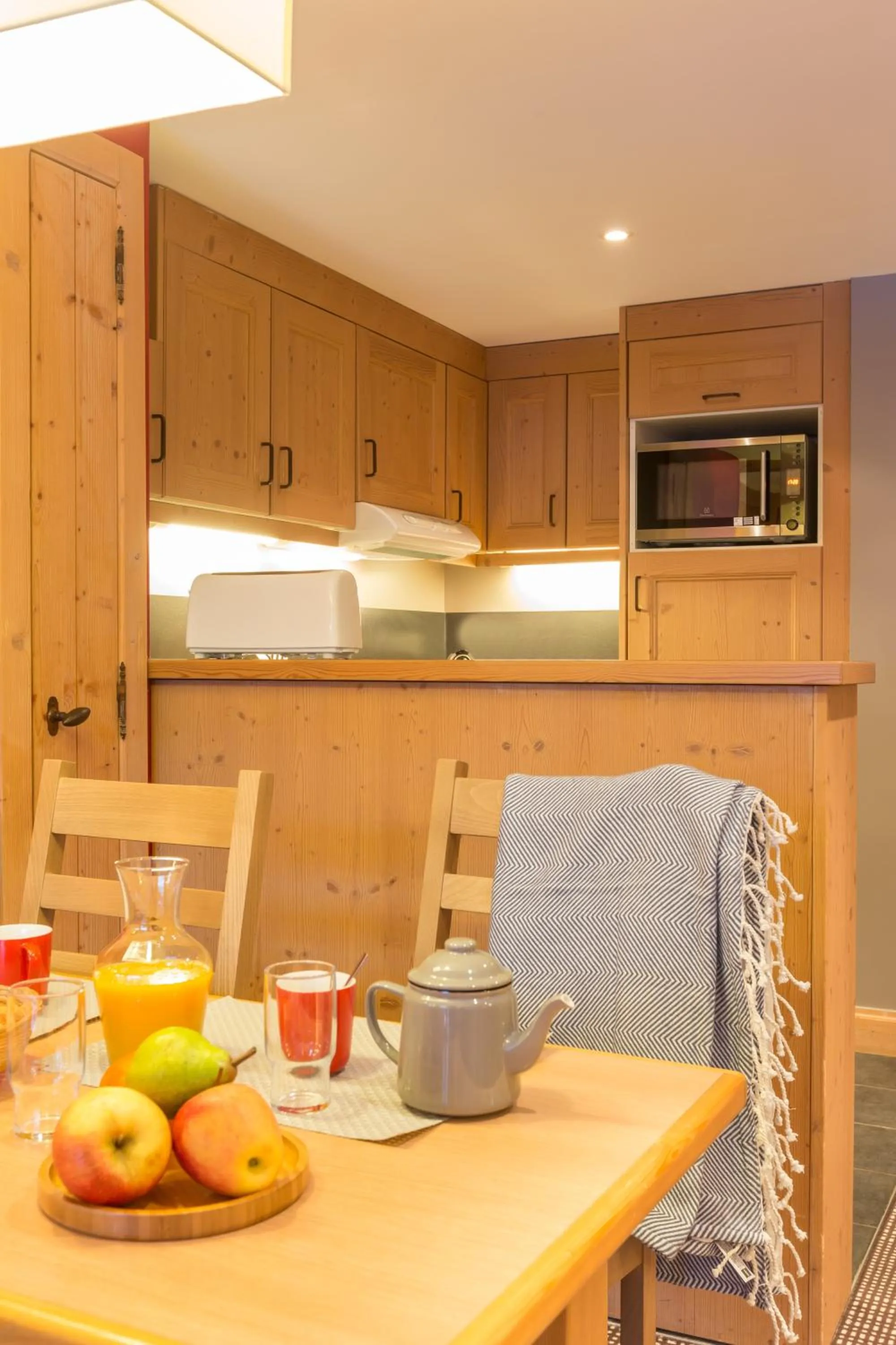 Kitchen or kitchenette in Résidence Pierre & Vacances Premium les Crets