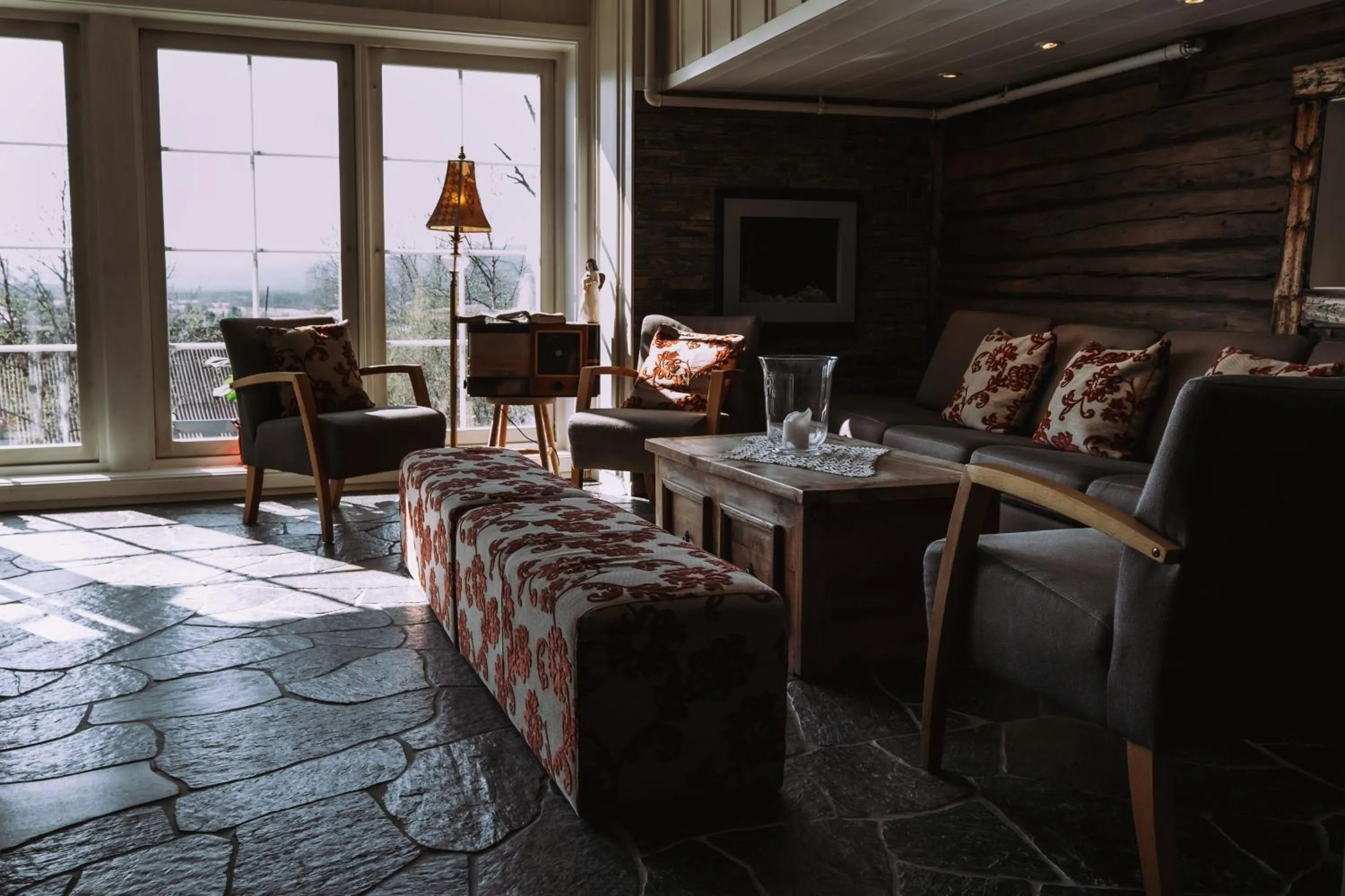 Communal lounge/ TV room in Erzscheidergaarden Hotell