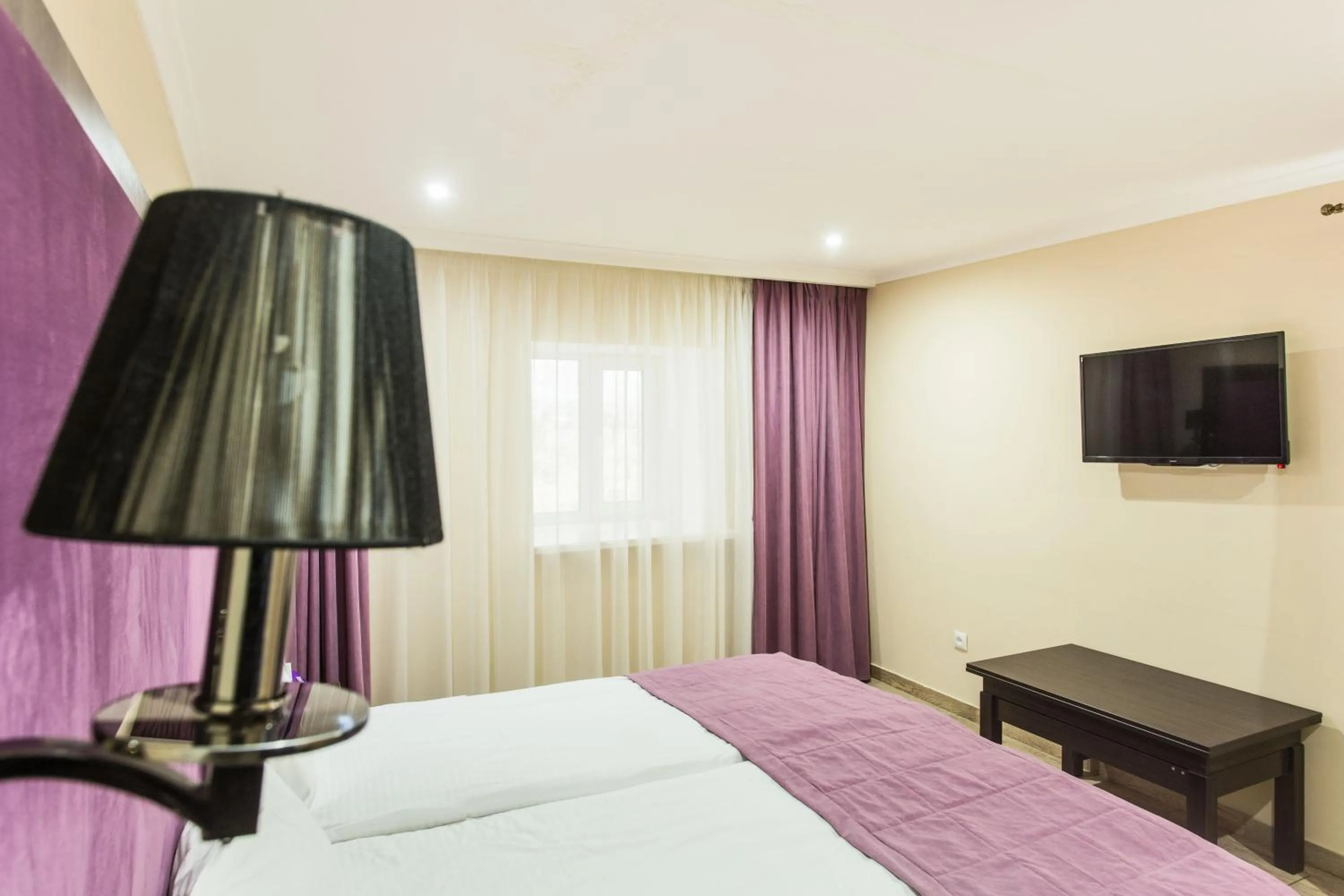 Bed in Hotel Baron