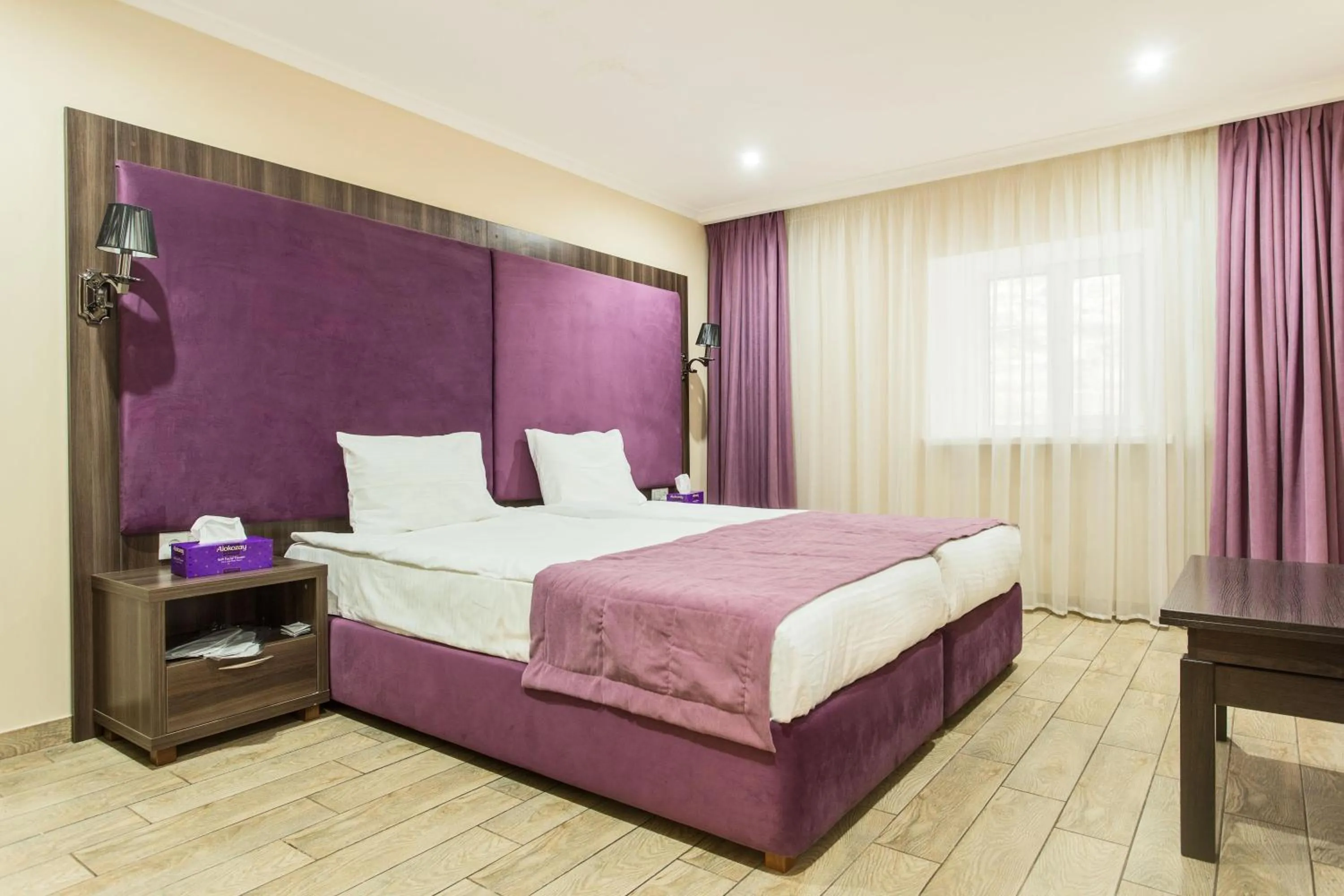 Bed in Hotel Baron