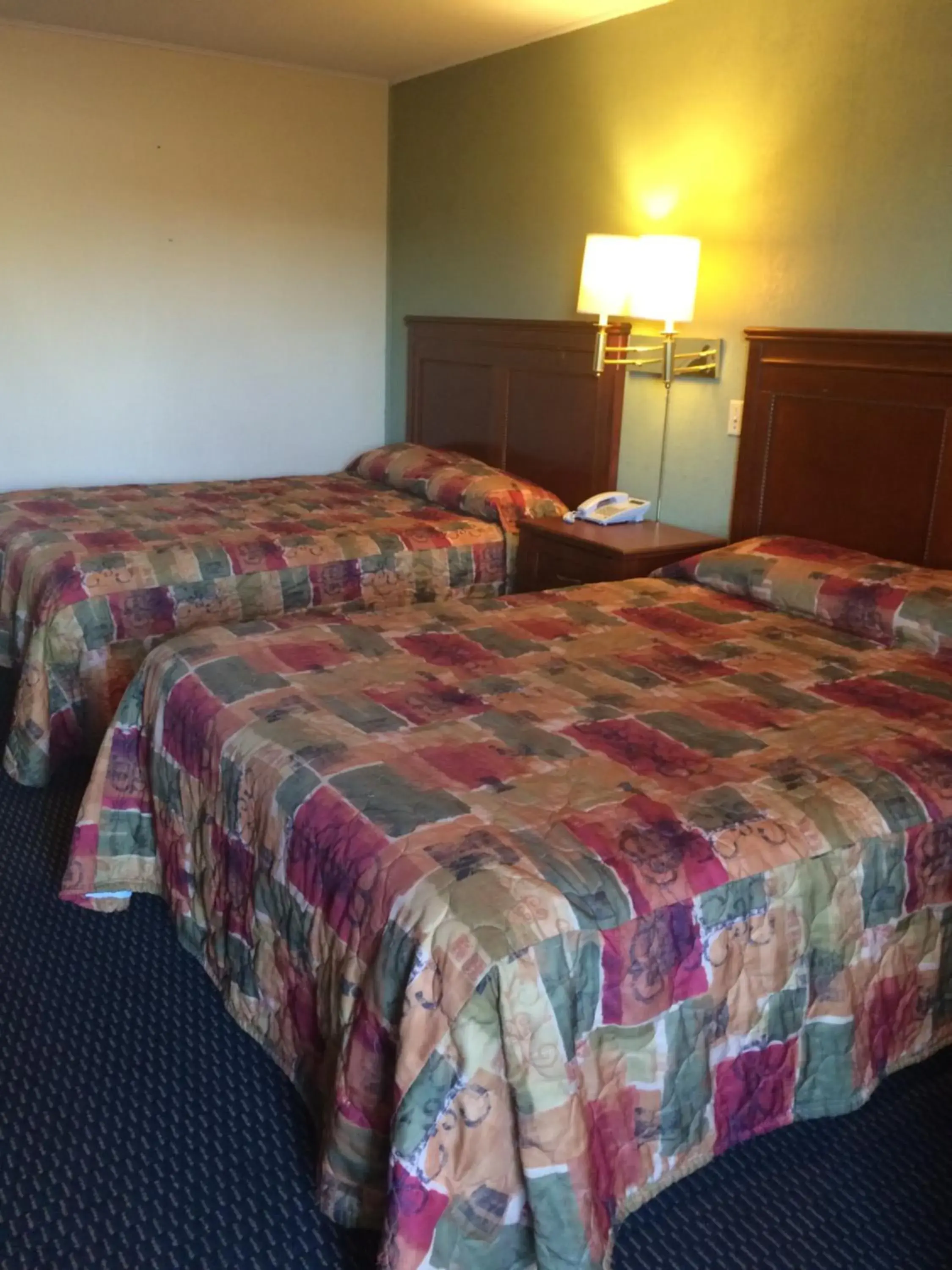 Bed in Rest Inn - Extended Stay, I-40 Airport, Wedding & Event Center
