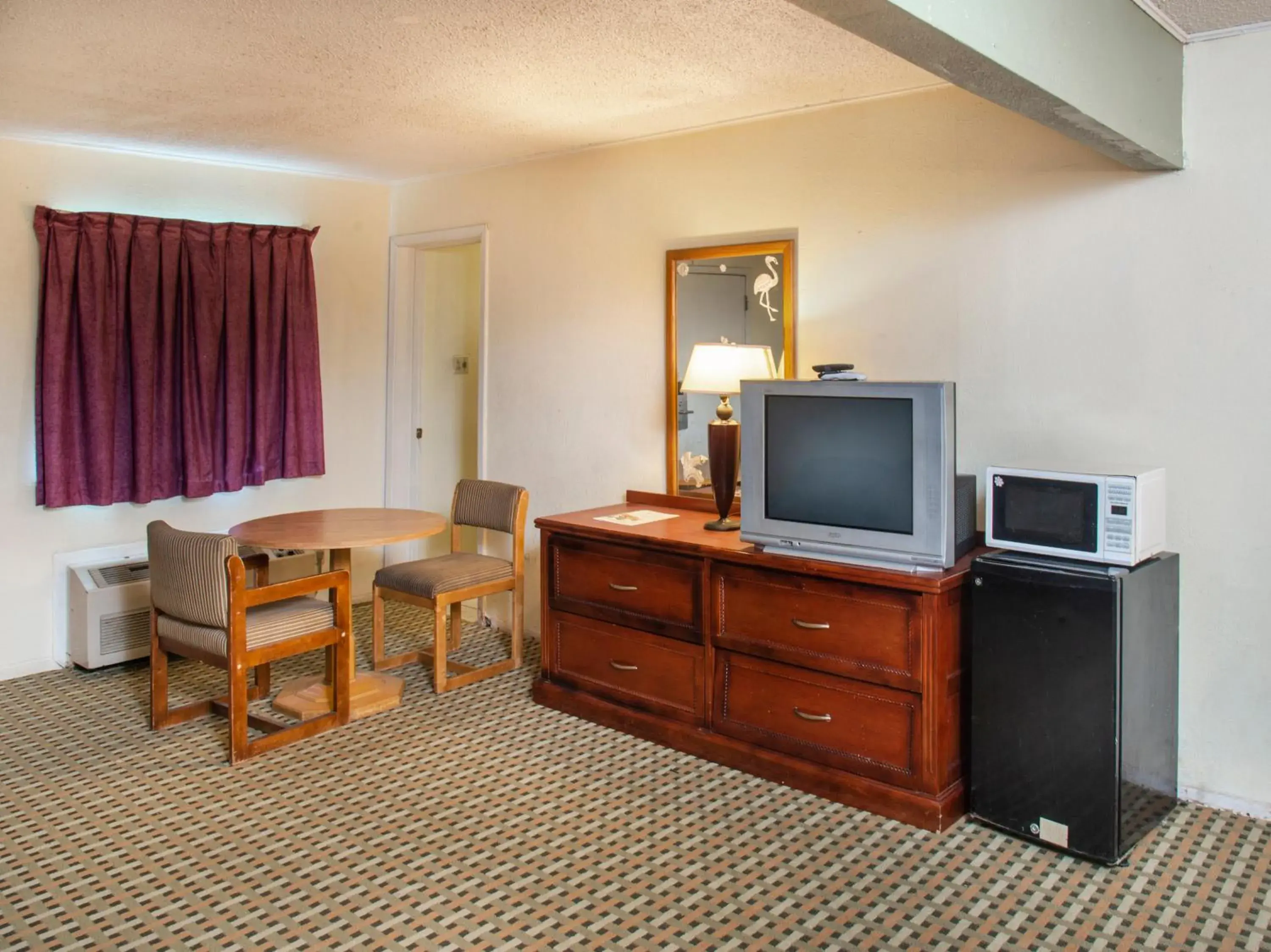 TV and multimedia, TV/Entertainment Center in Rest Inn - Extended Stay, I-40 Airport, Wedding & Event Center