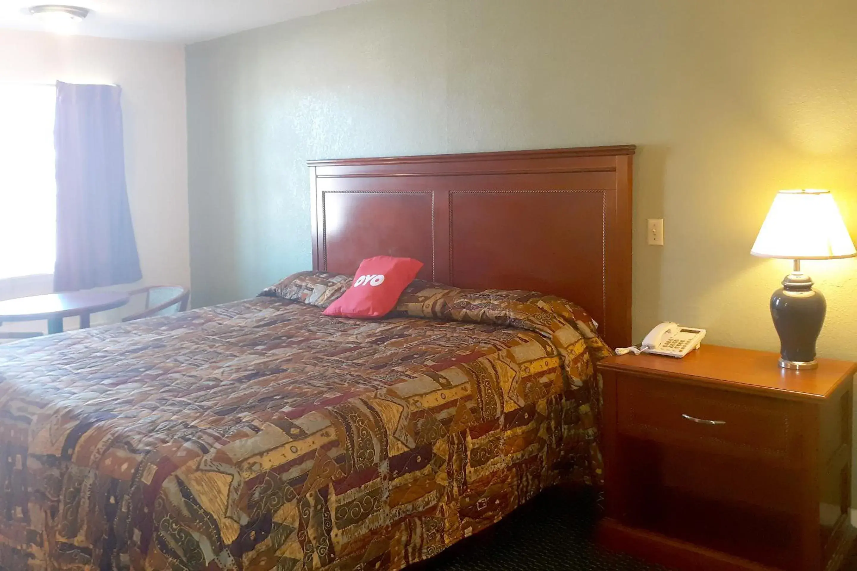 Bedroom, Bed in Rest Inn - Extended Stay, I-40 Airport, Wedding & Event Center