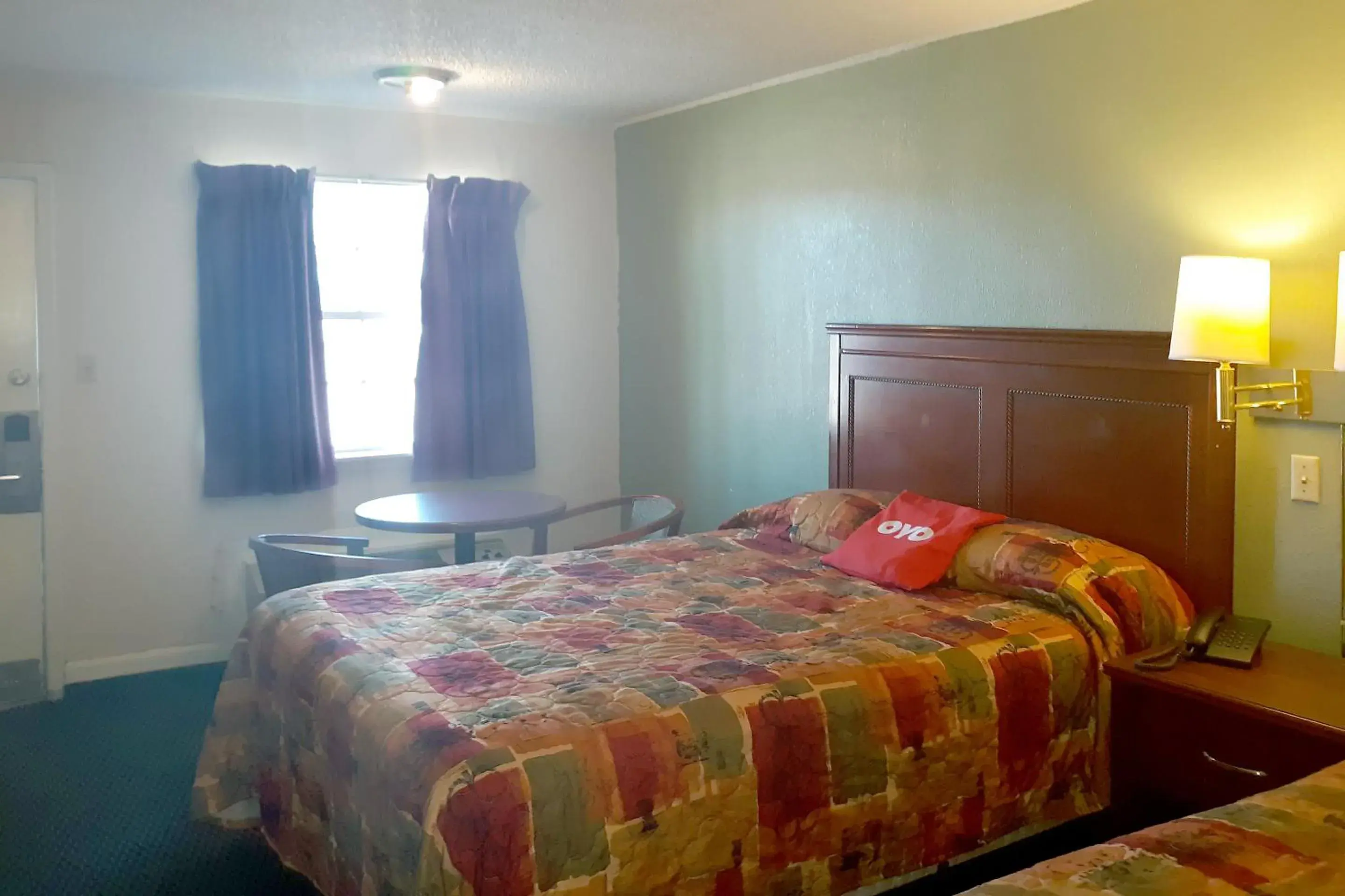 Bedroom, Bed in Rest Inn - Extended Stay, I-40 Airport, Wedding & Event Center