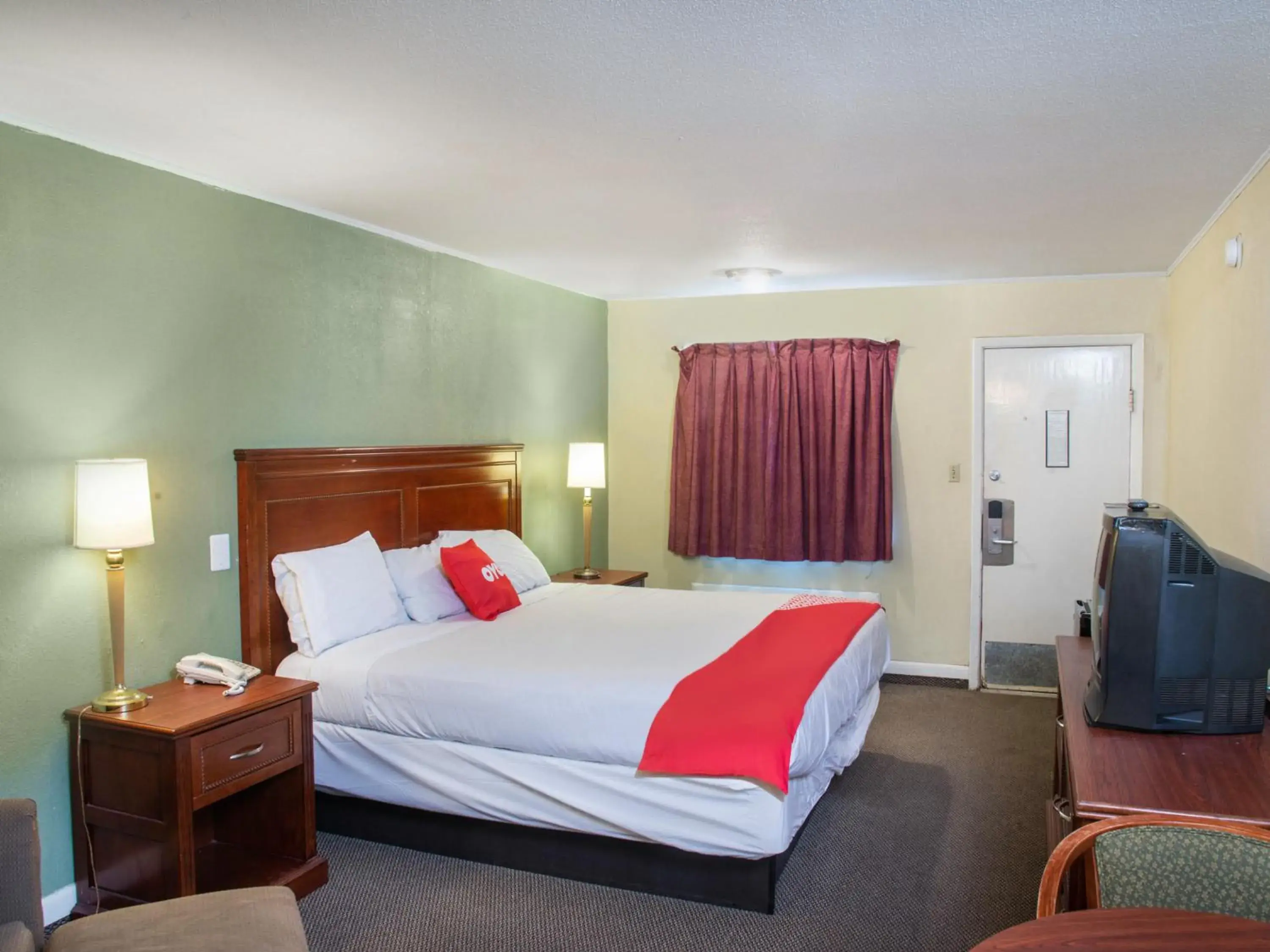 Bedroom, Bed in Rest Inn - Extended Stay, I-40 Airport, Wedding & Event Center