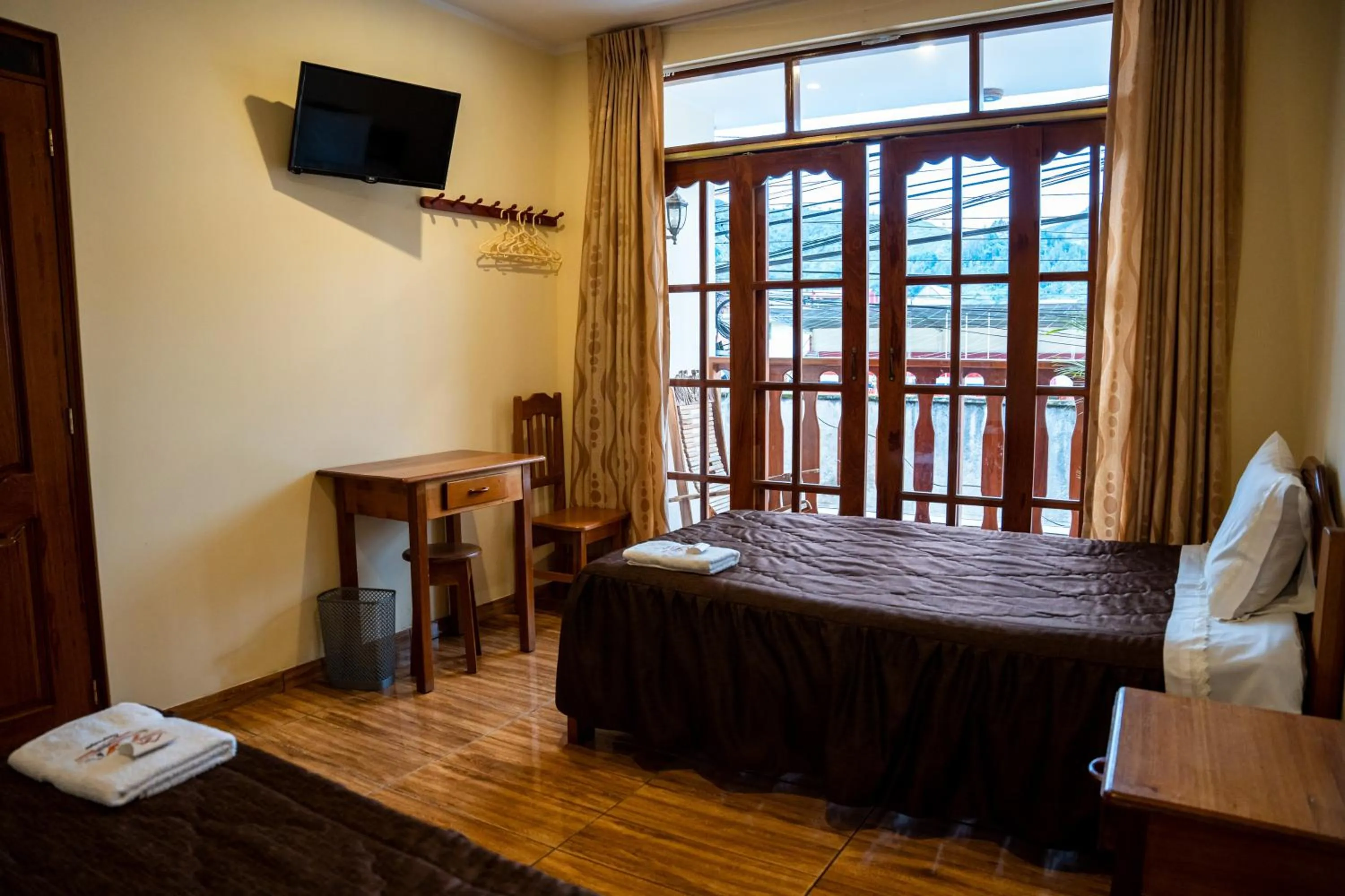 Bed in Hospedaje Chimy