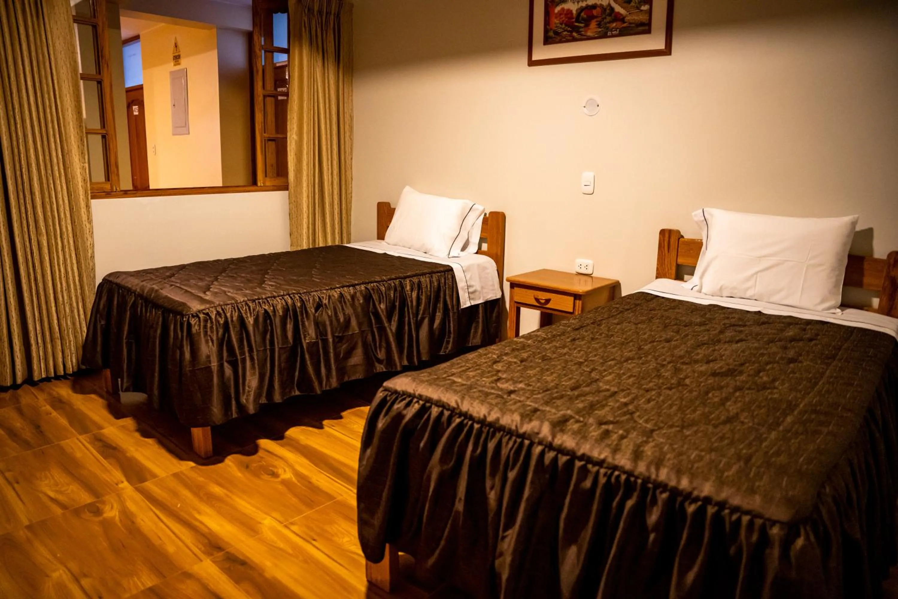 Bed in Hospedaje Chimy