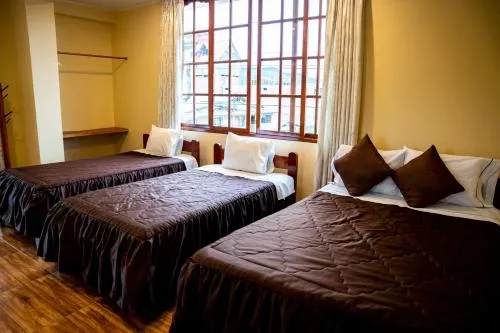 Bed in Hospedaje Chimy