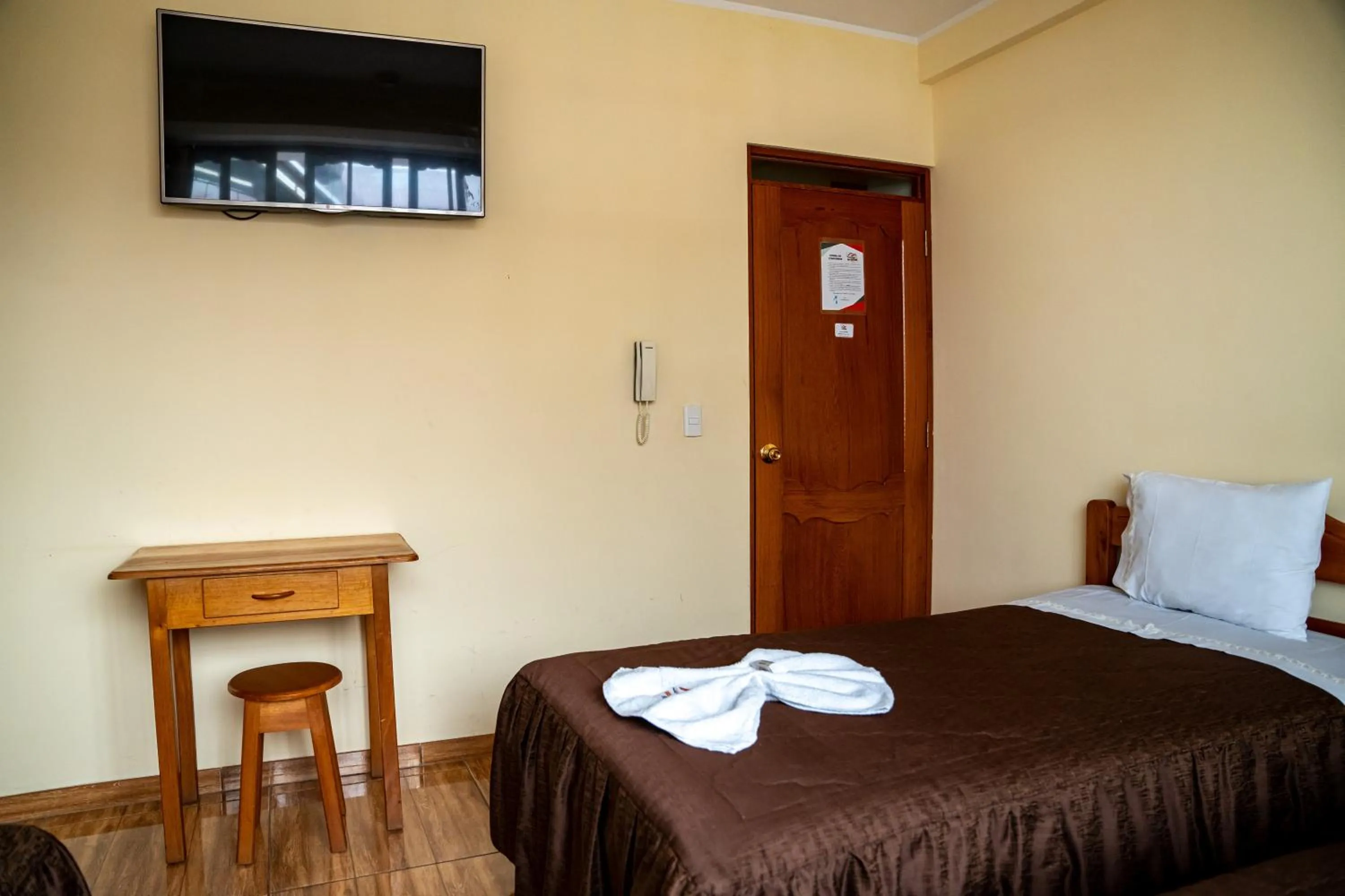 Bed in Hospedaje Chimy