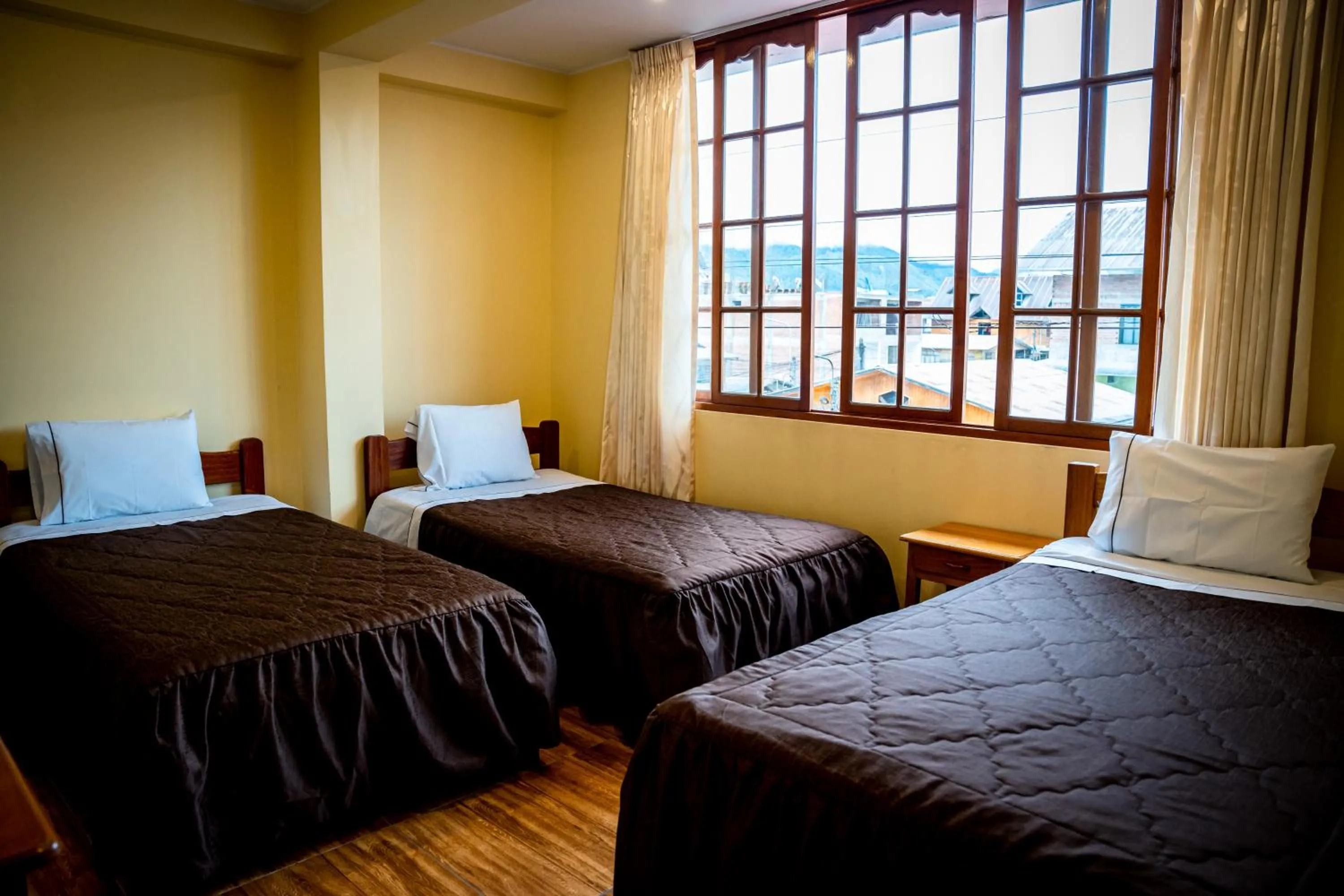Bed in Hospedaje Chimy