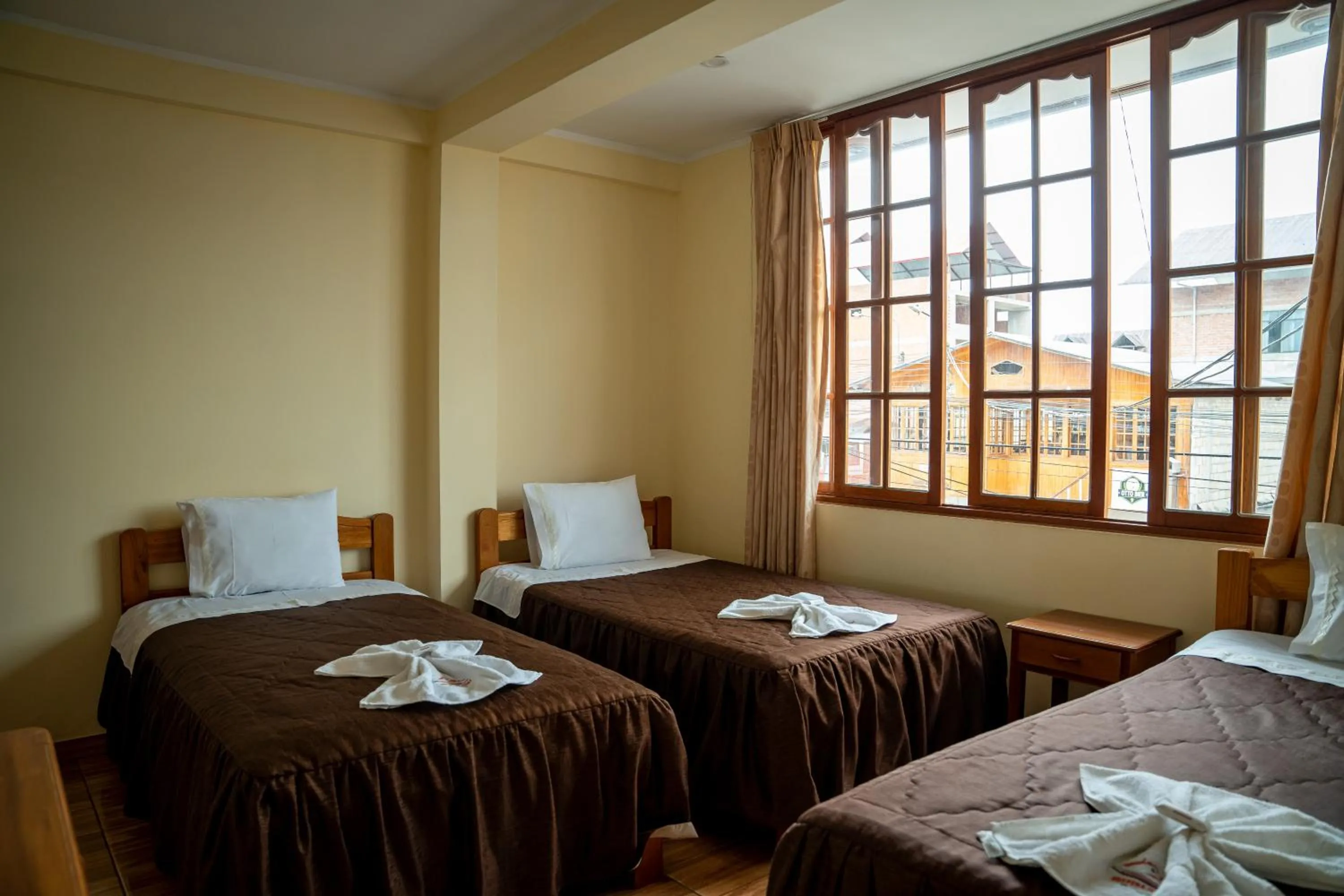 Bed in Hospedaje Chimy