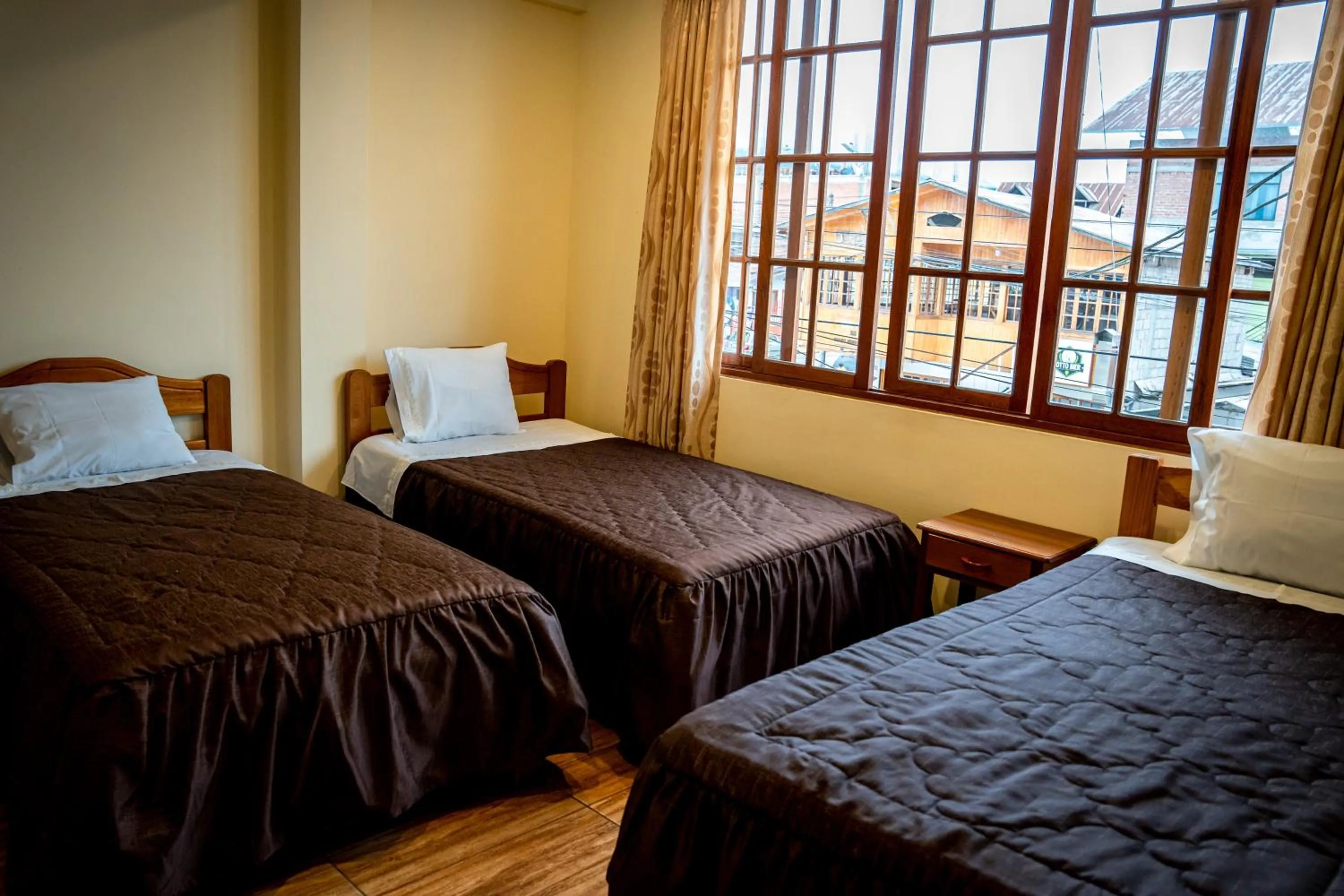 Bed in Hospedaje Chimy