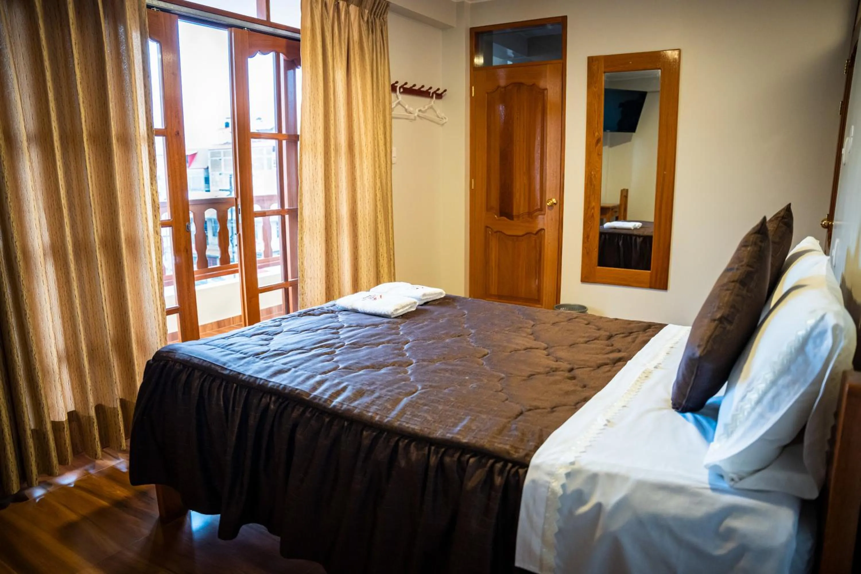 Bed in Hospedaje Chimy