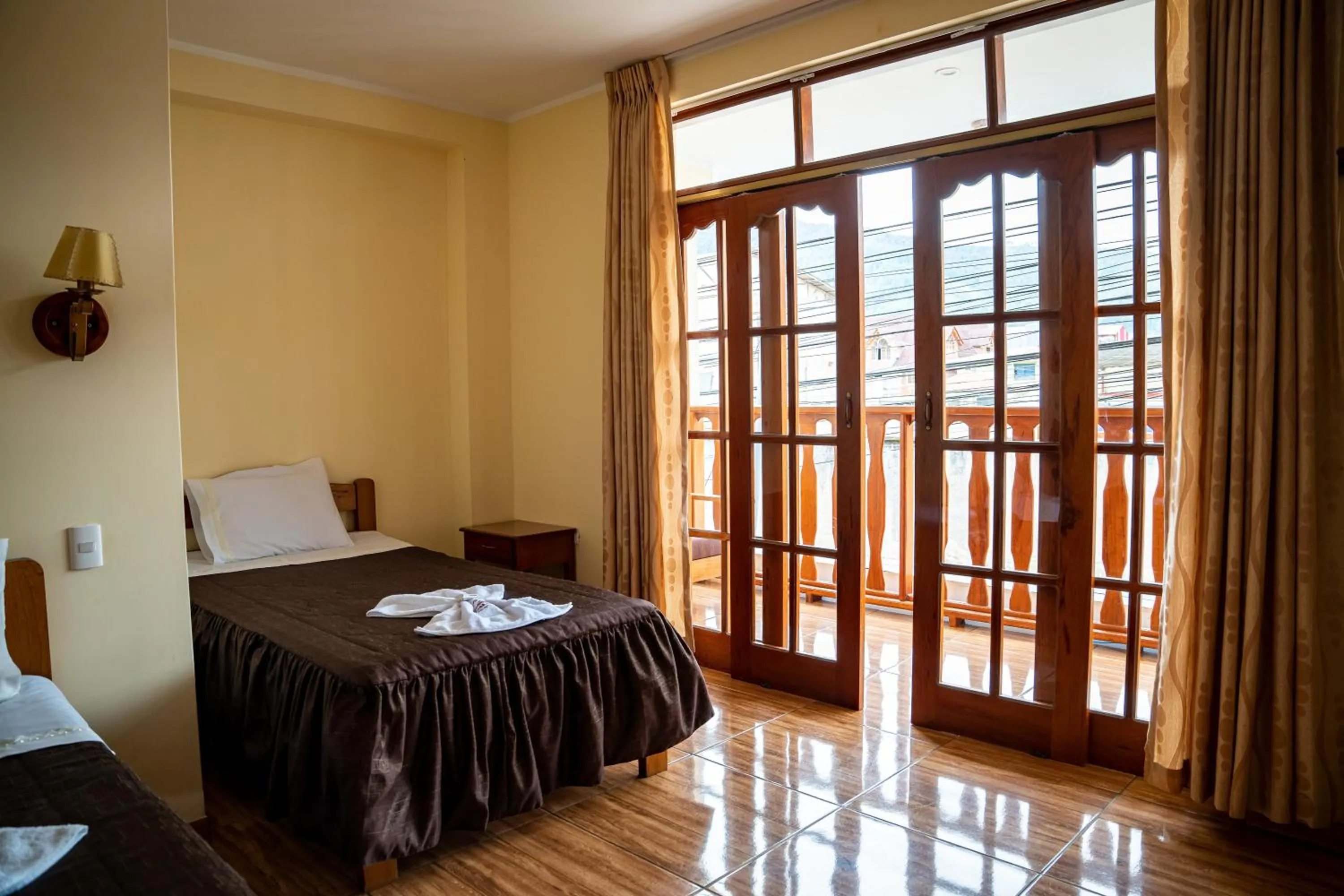 Bed in Hospedaje Chimy